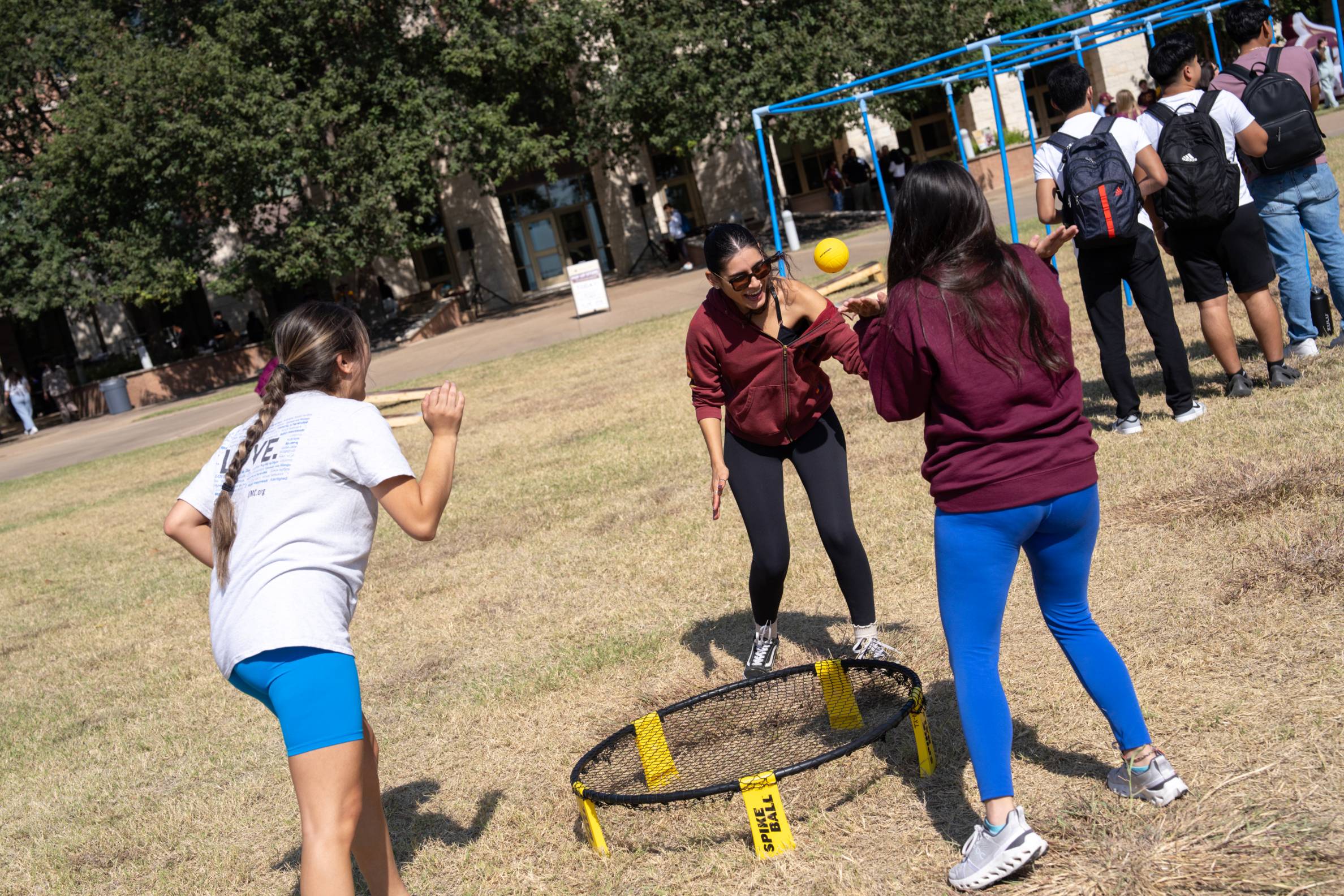 students playing spikeball