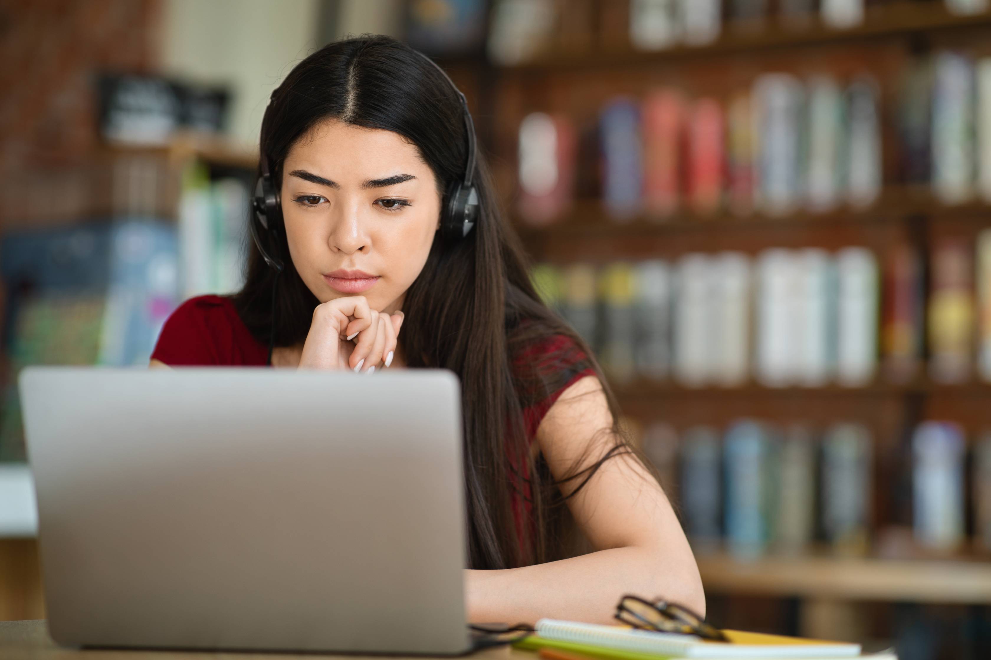woman looking at a laptop