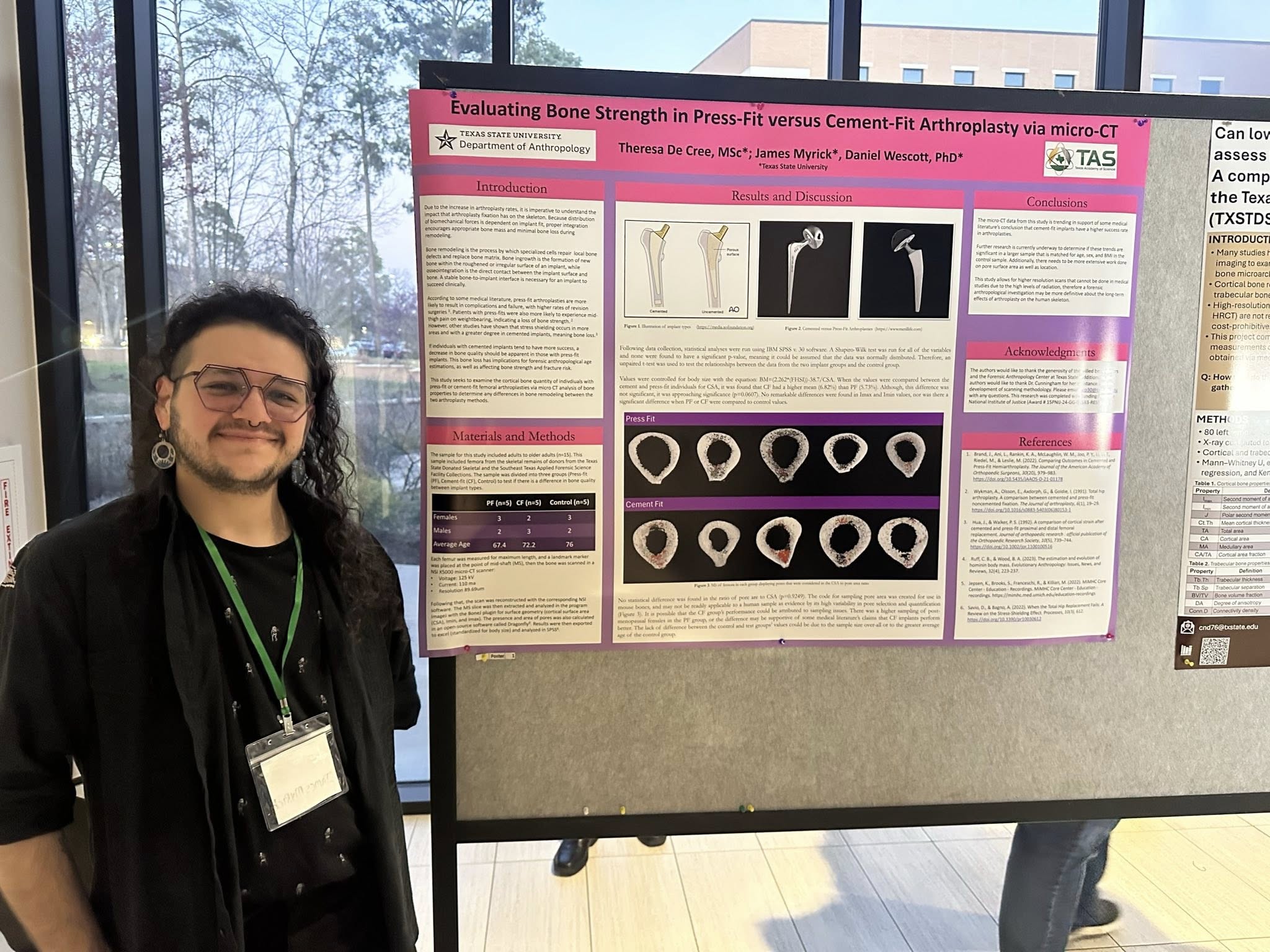 James Myrick displays his poster presentation.