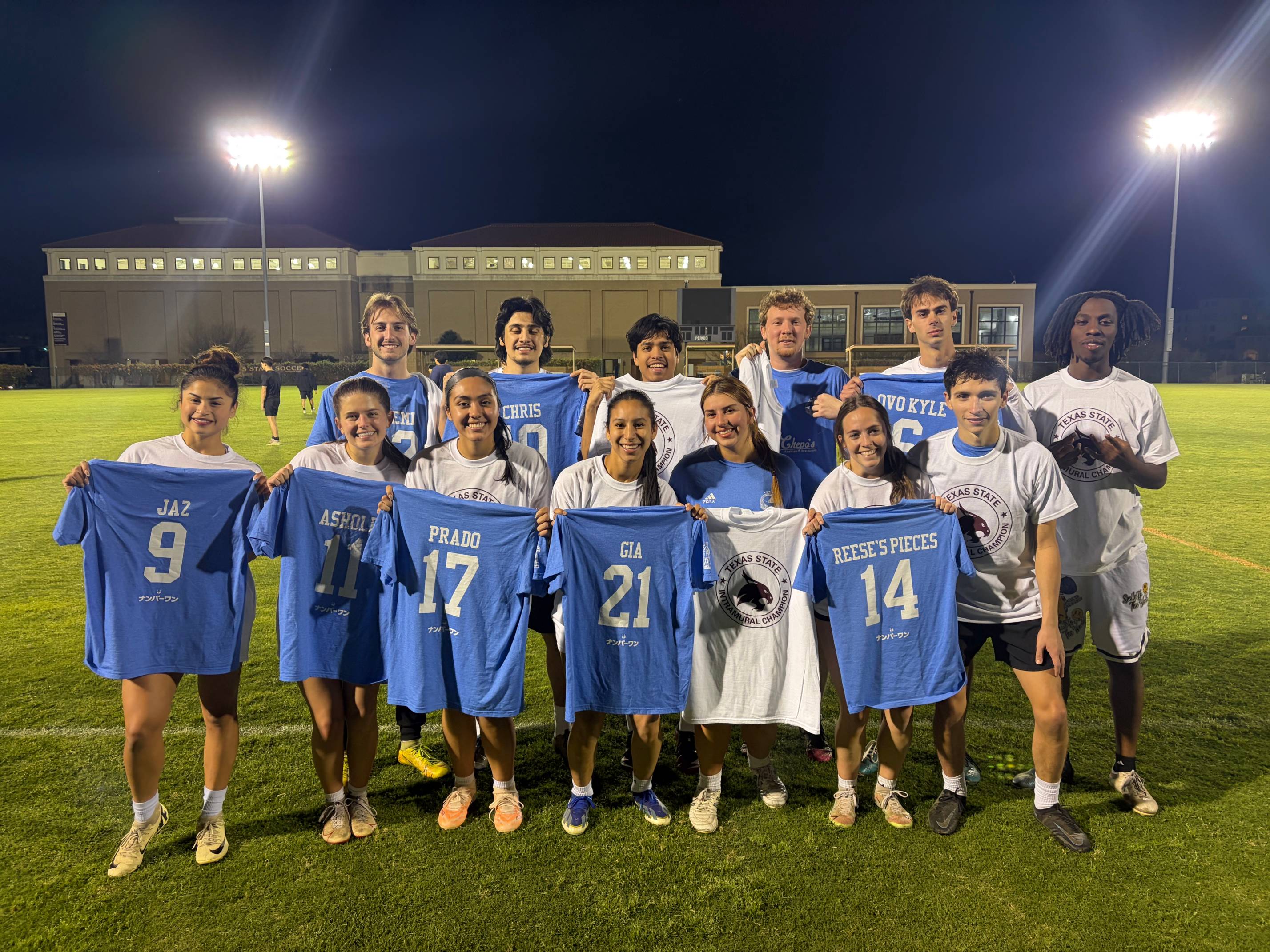 Intramurals champions from corec soccer league pose with shirt
