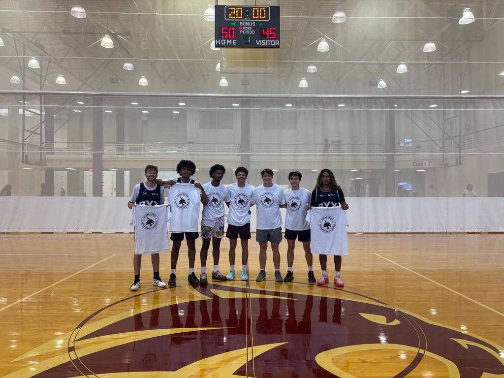 Intramural champs pose with photos after win