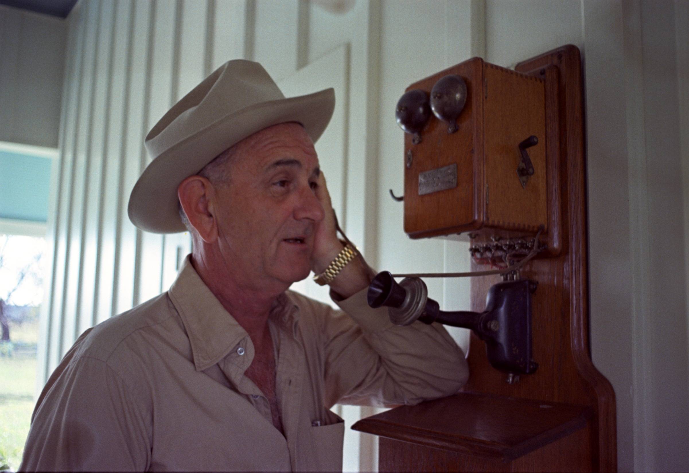 LBJ on a vintage crank phone.