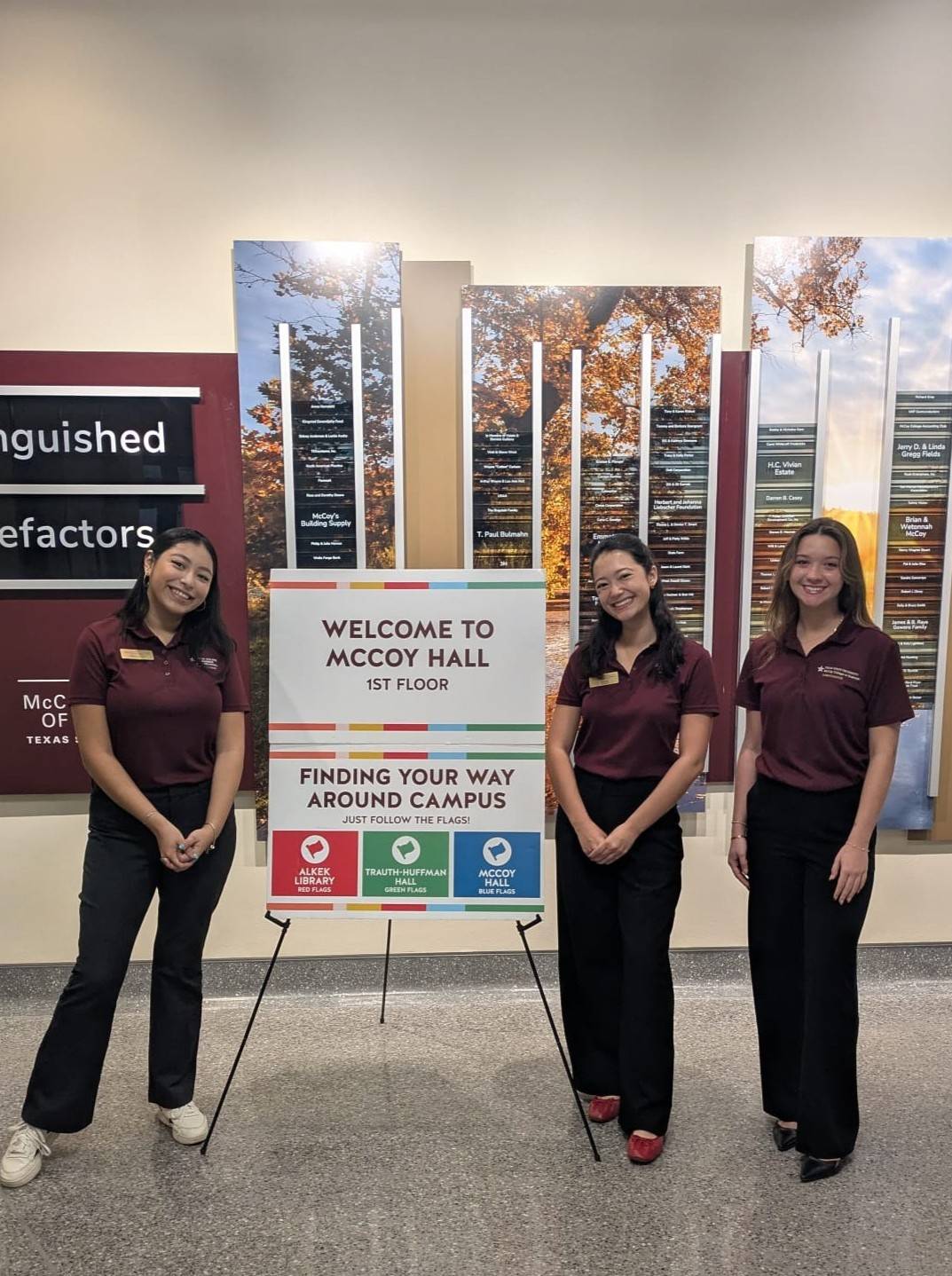 Three McCoy Ambassadors helping guide students in McCoy for Bobcat Day