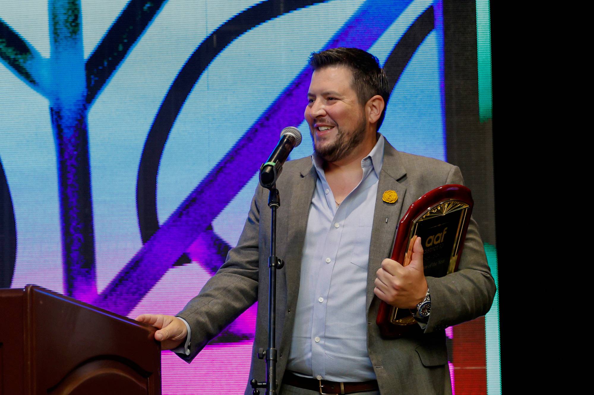 The Texas State NSAC team, faculty advisor Dr. Mike Devlin receiving Educator of the Year for AAF District 10.