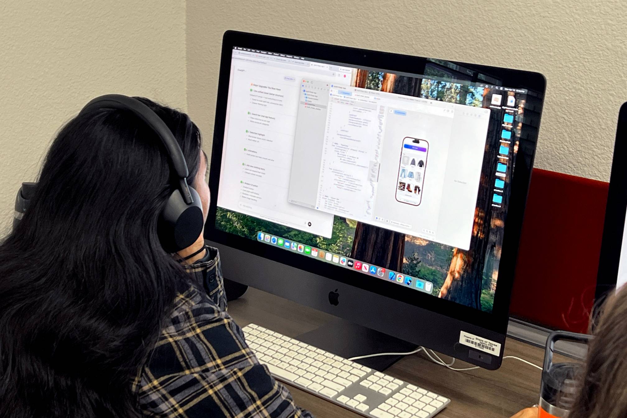 Photo of student coding mobile app