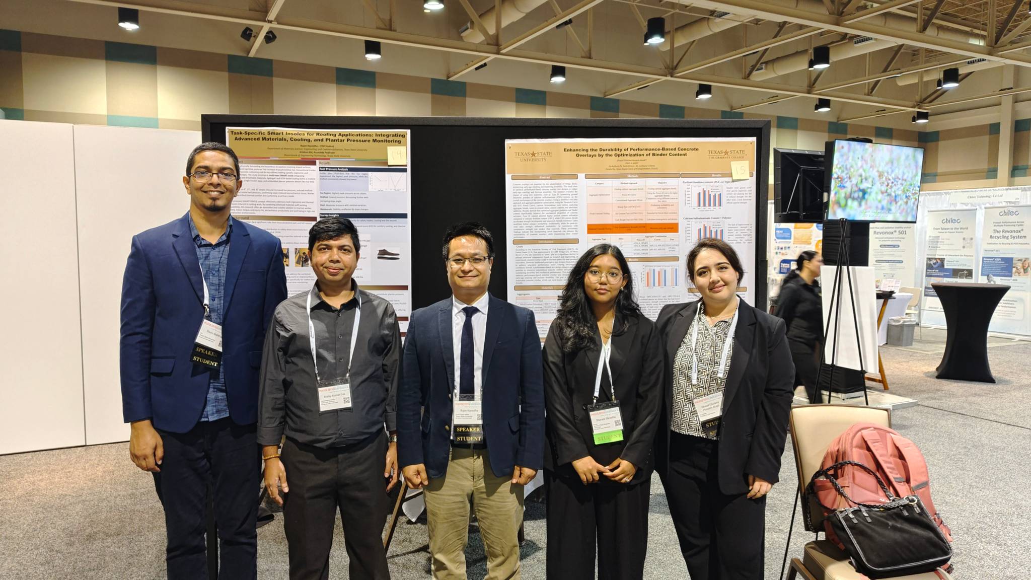 PREM Students at SPE Conference in front of research posters