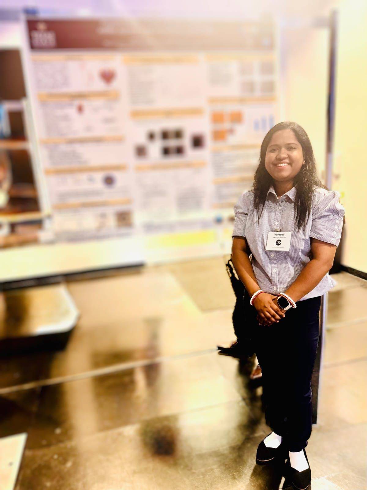 PREM Student, Keya Das, presenting research at poster session of Texas Society for Microscopy (TSM) Meeting