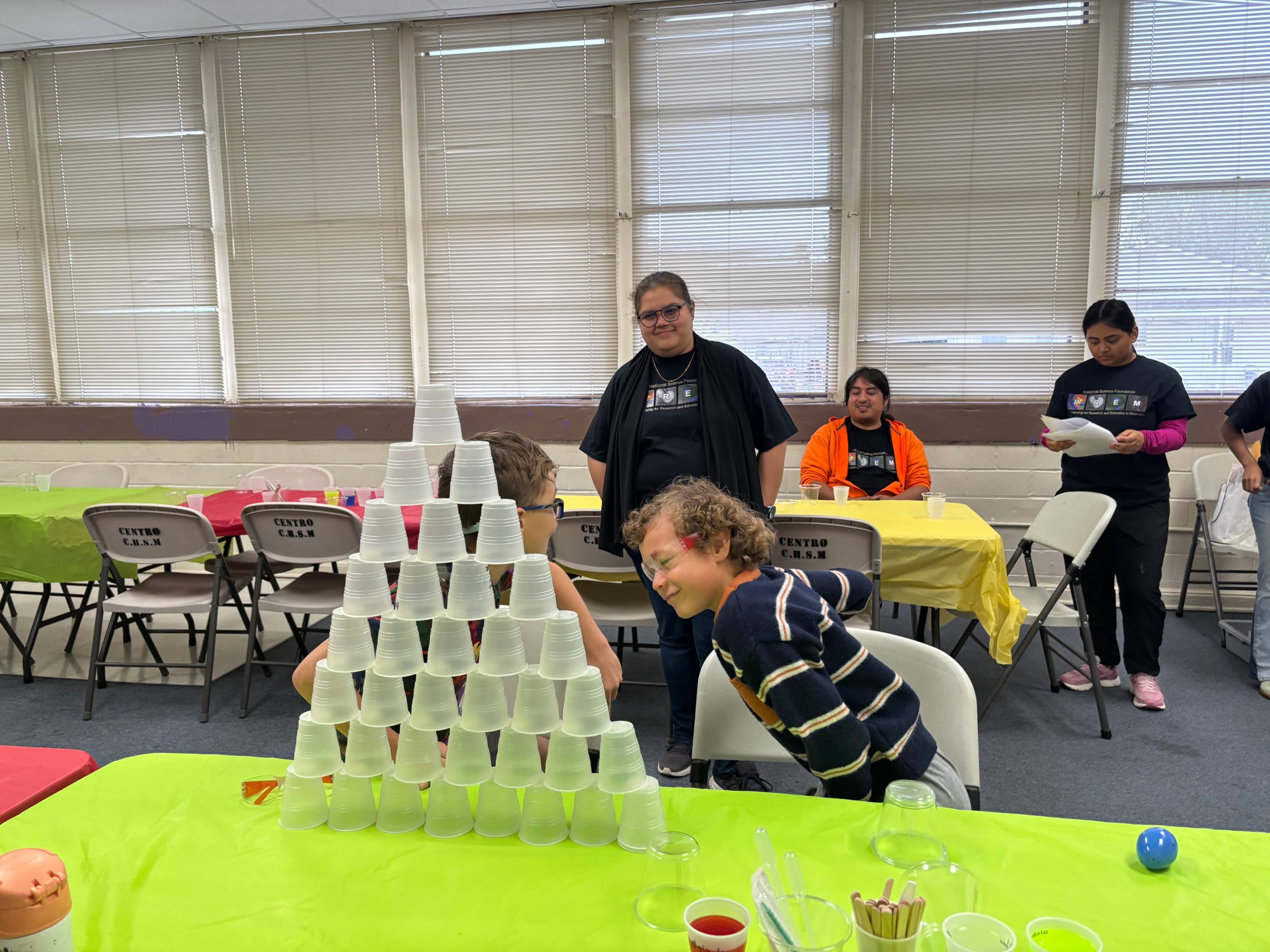 PREM Student showcasing STEM Demos to children and families