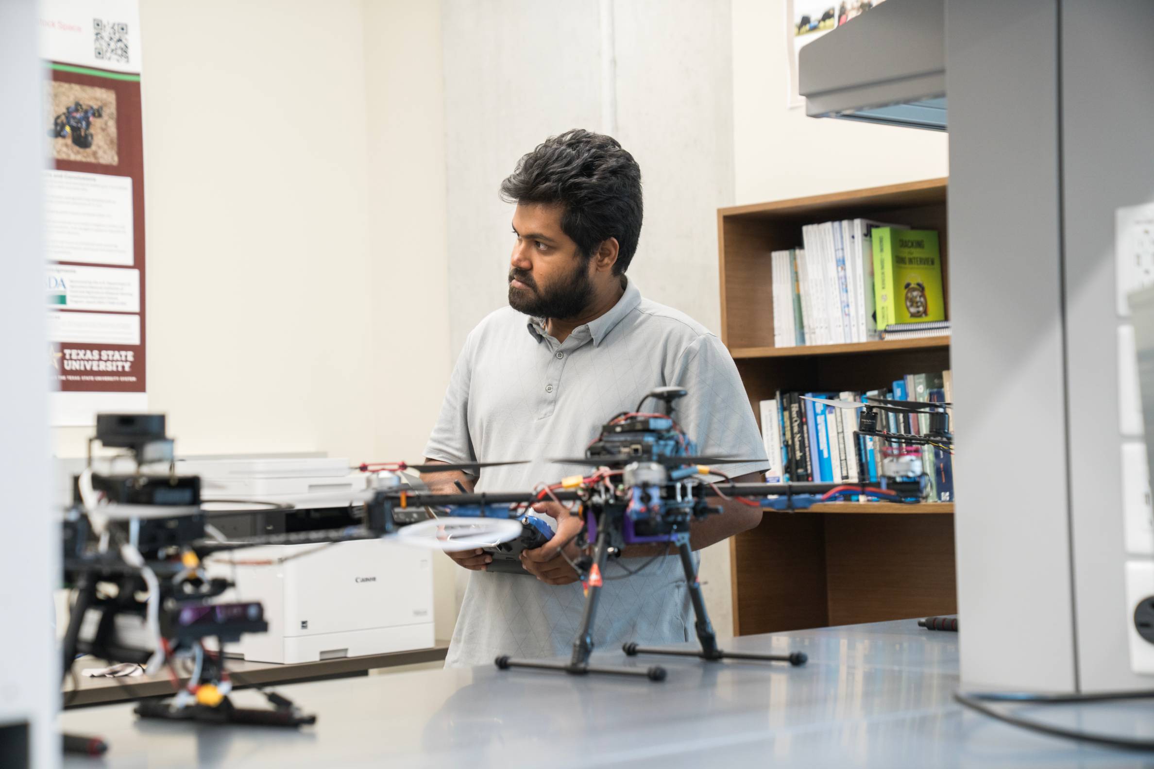 man shows off drone
