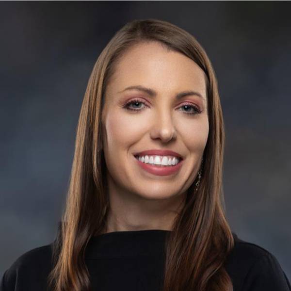 Headshot of Jessica Schneider.