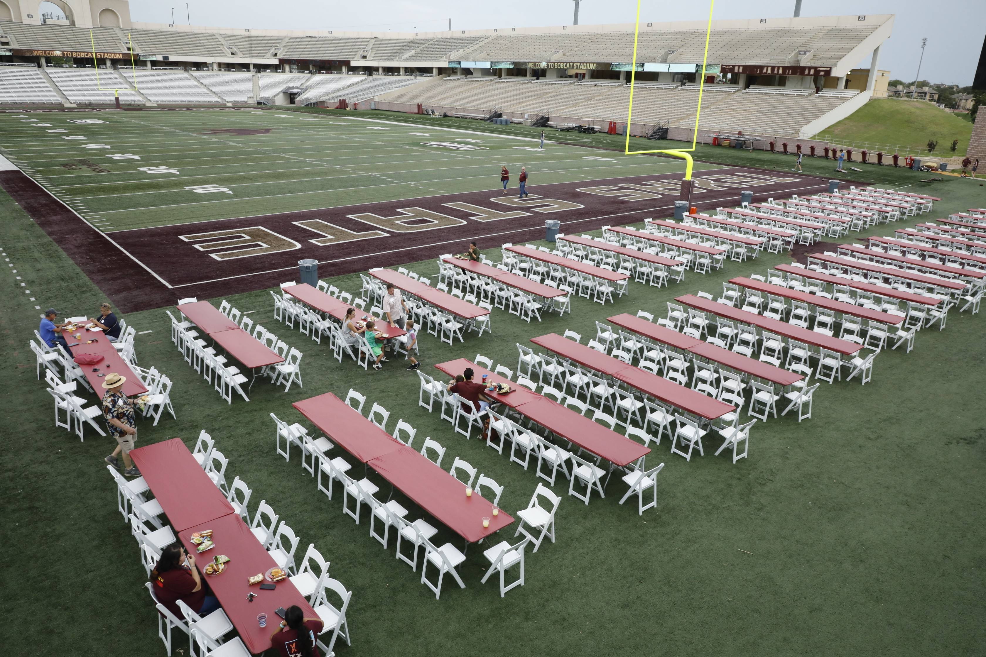 Tables and chairs on football field