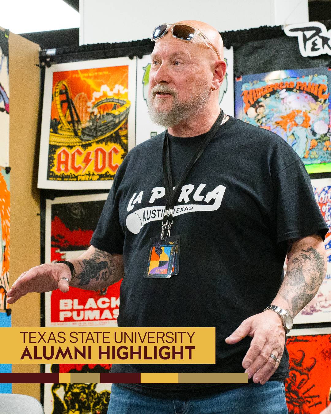 Billy Perkins in front of his poster art