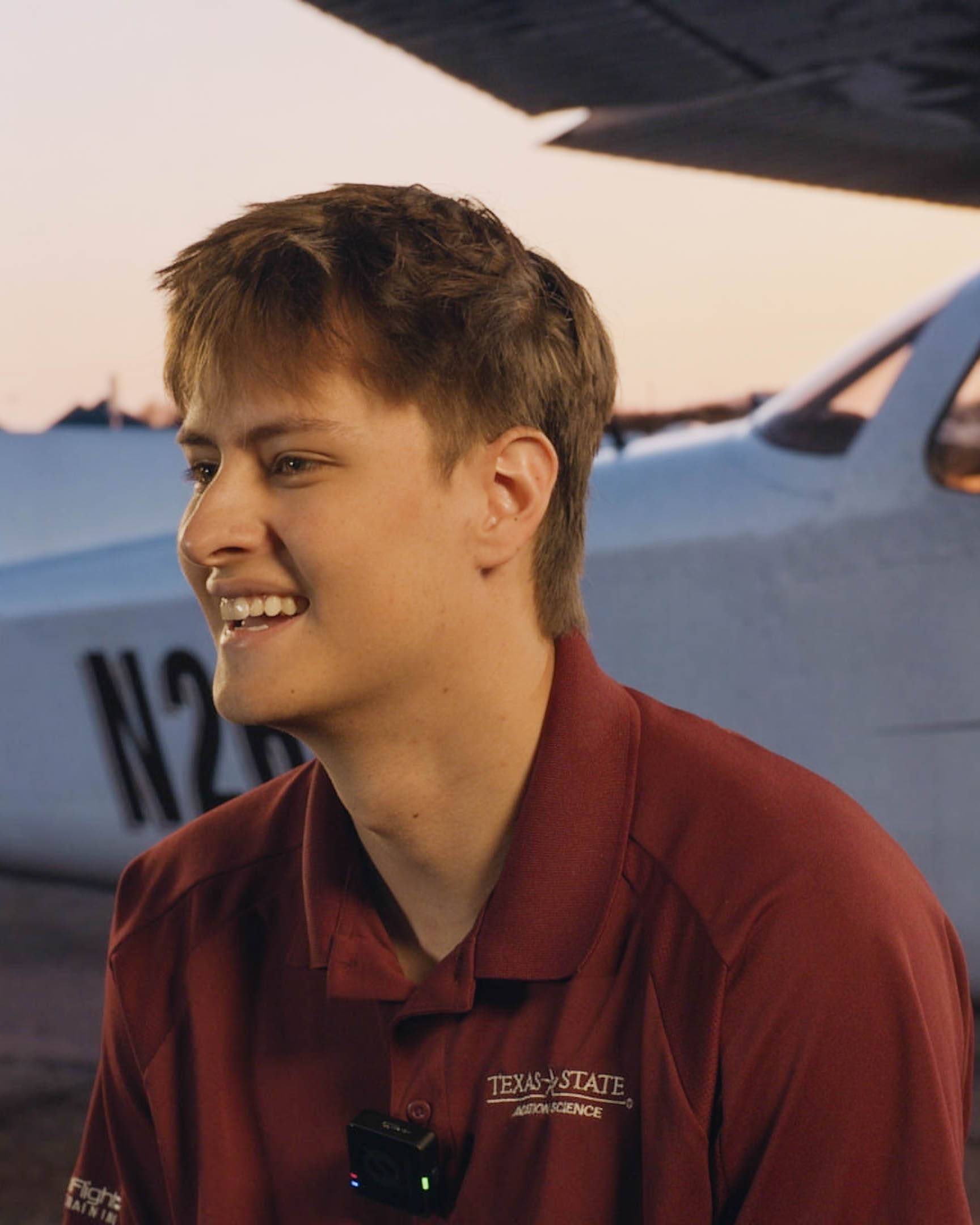 Brandon Barstow smiles during an aviation interview
