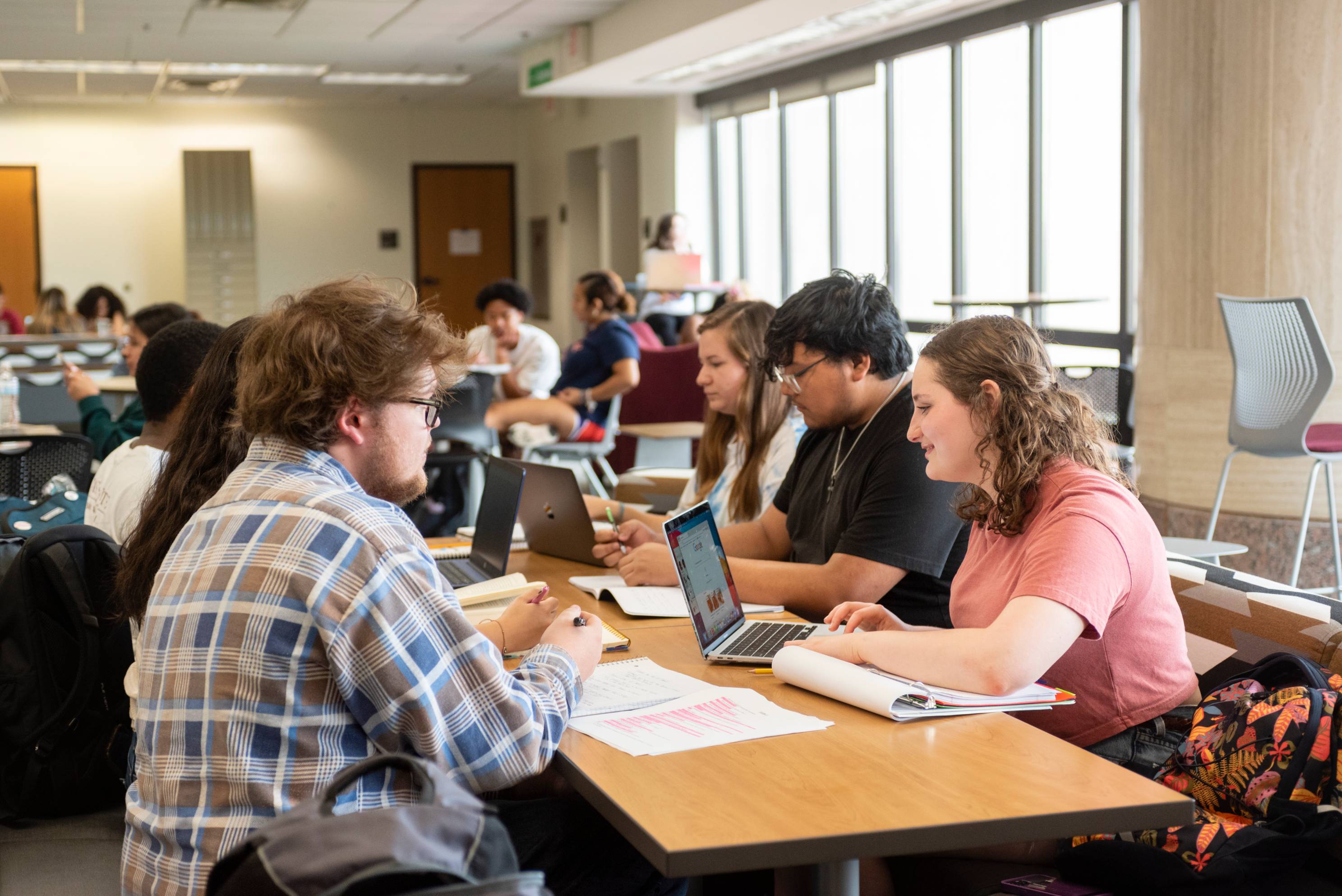 Students studying in a group. 