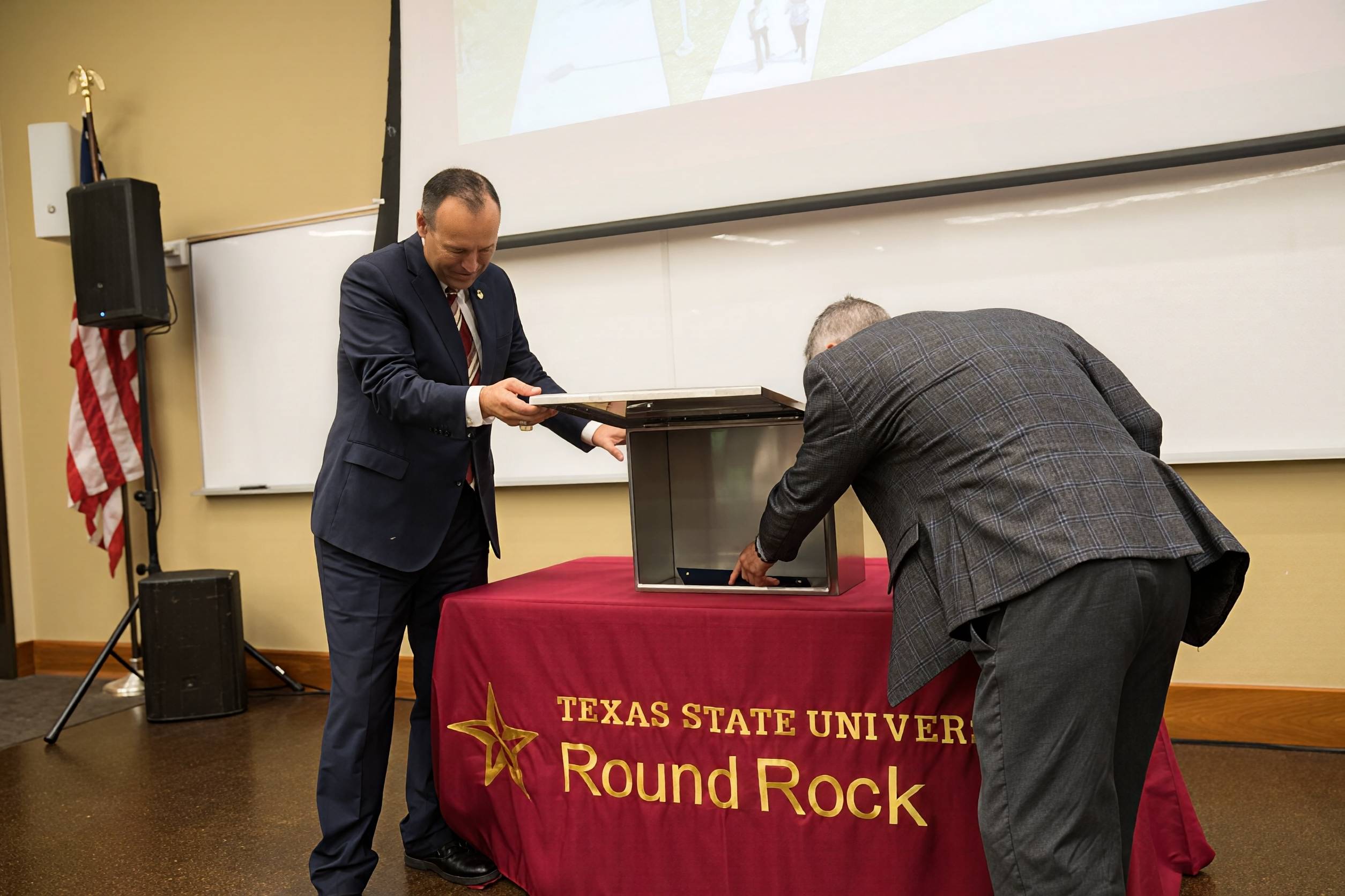Putting proclamation into time capsule.