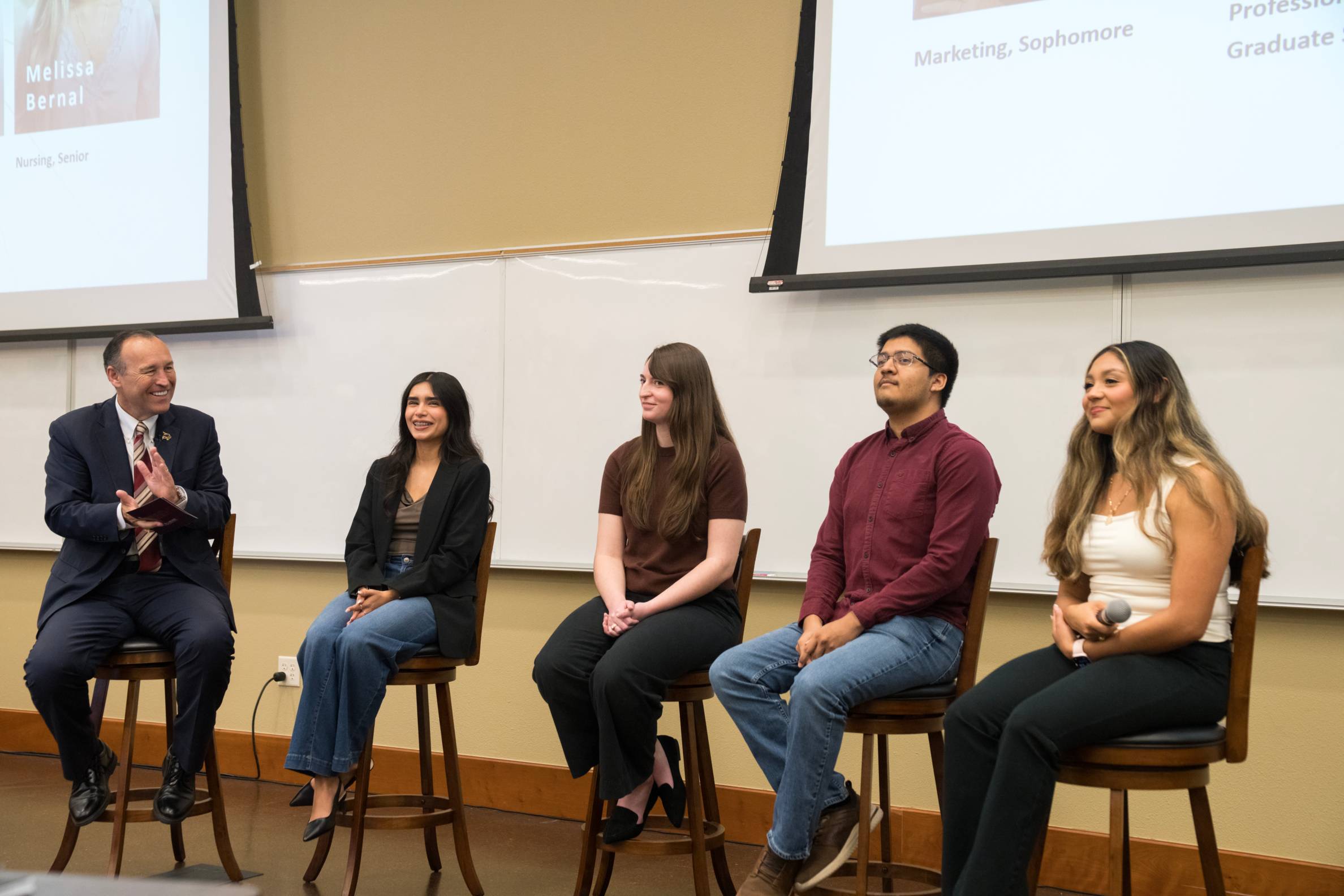 President Damphousse talking to a student panel.