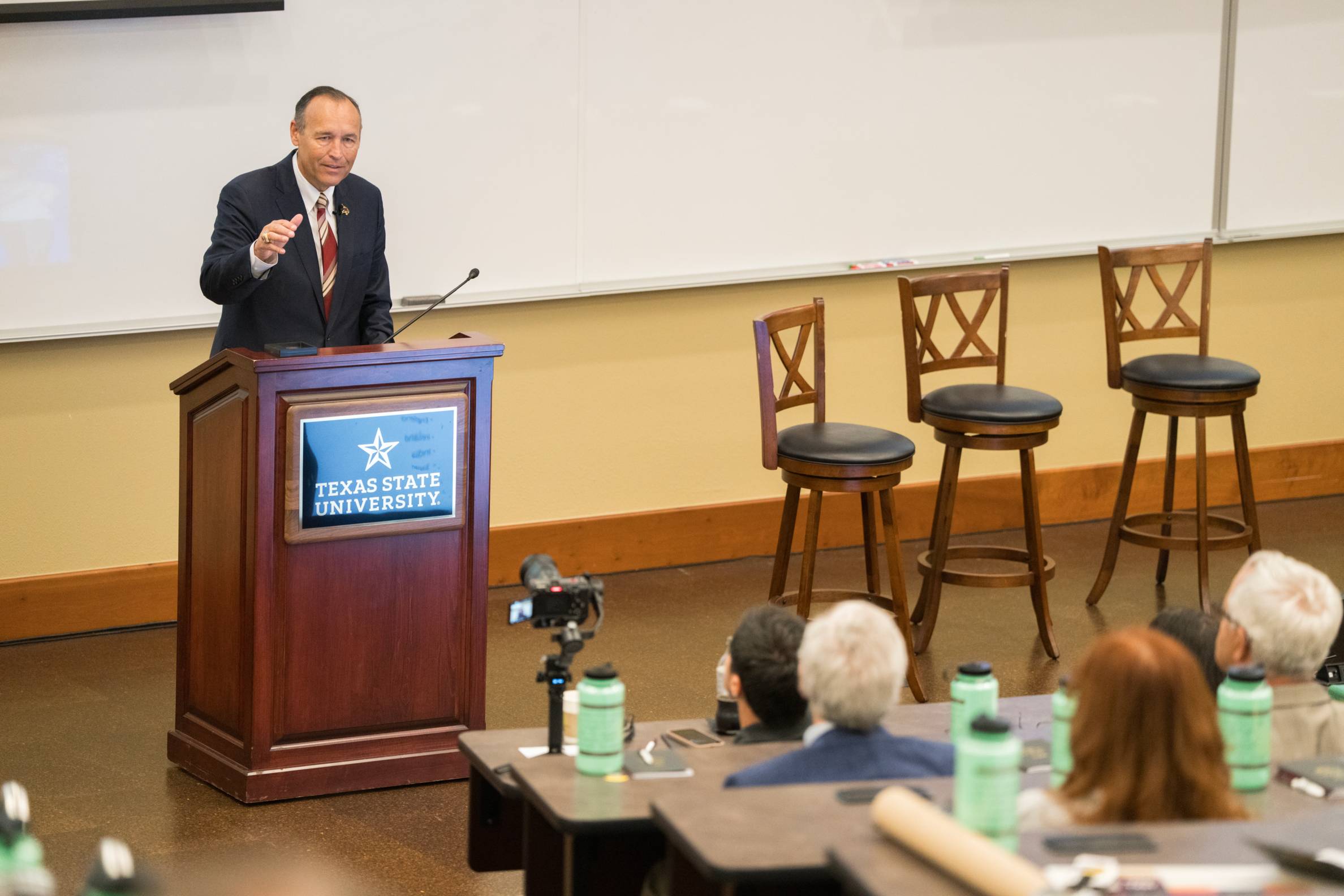 President Damphousse making a speech
