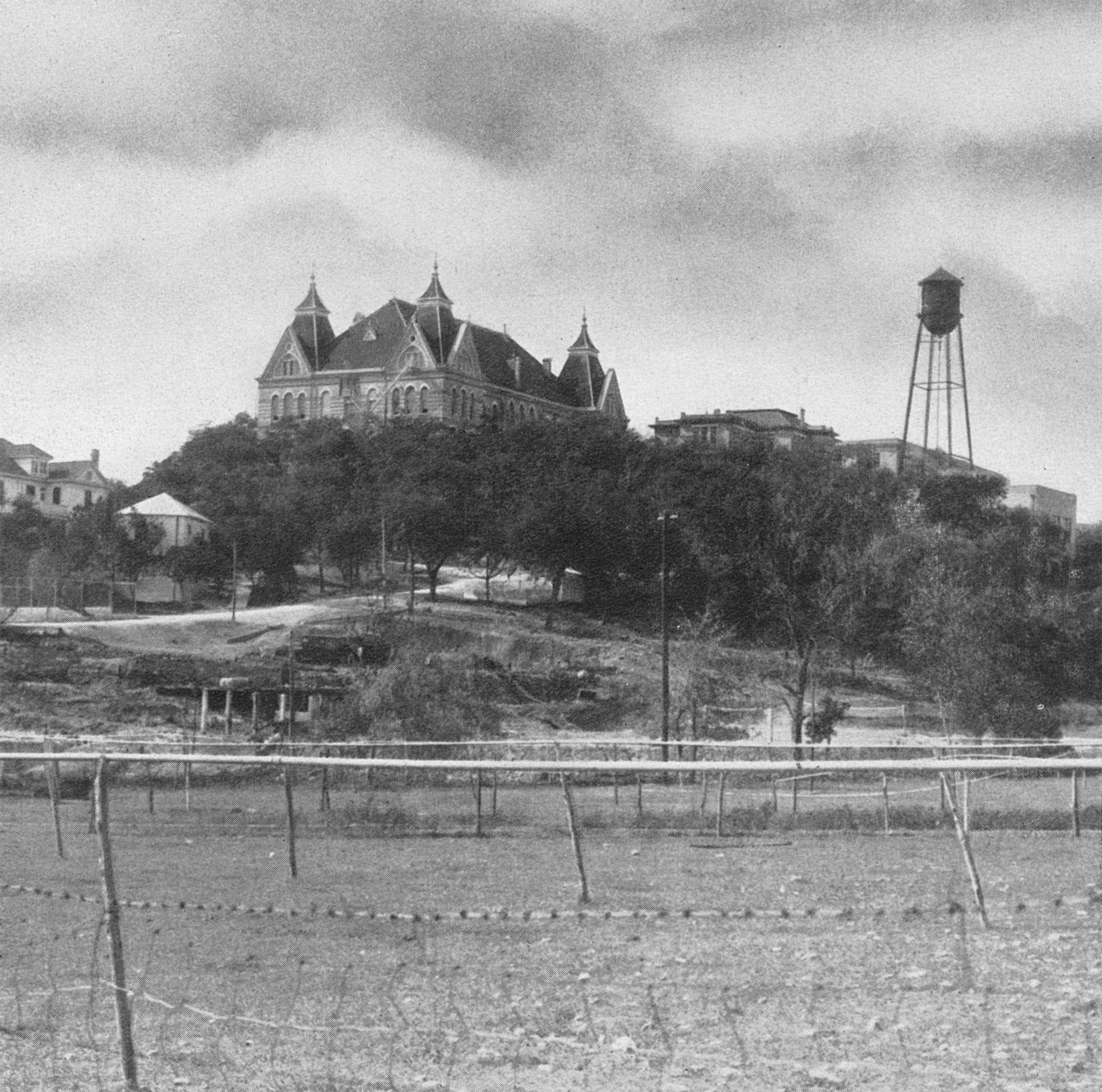 A black and picture of old main