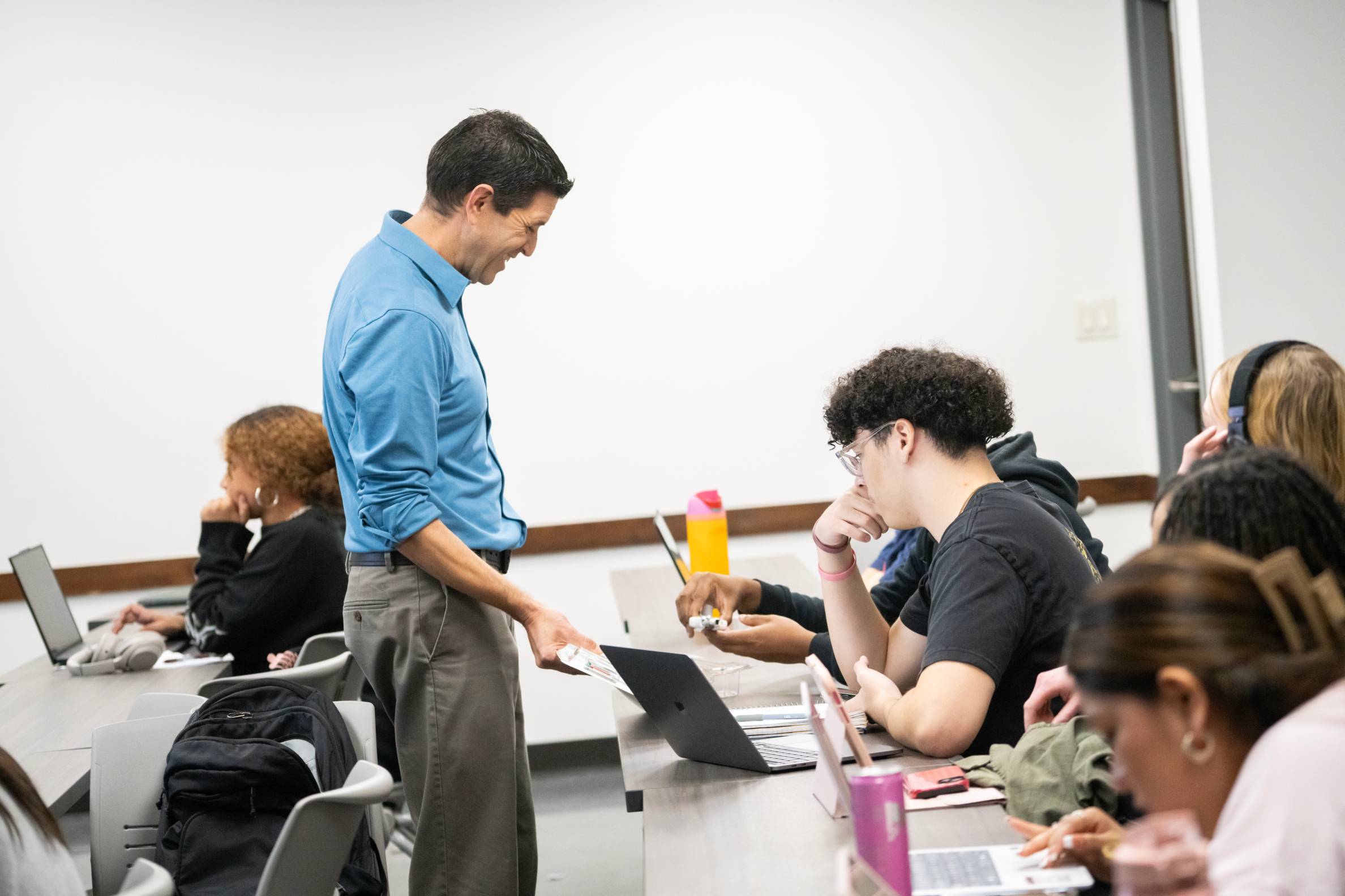 Stephen Garcia talking with students