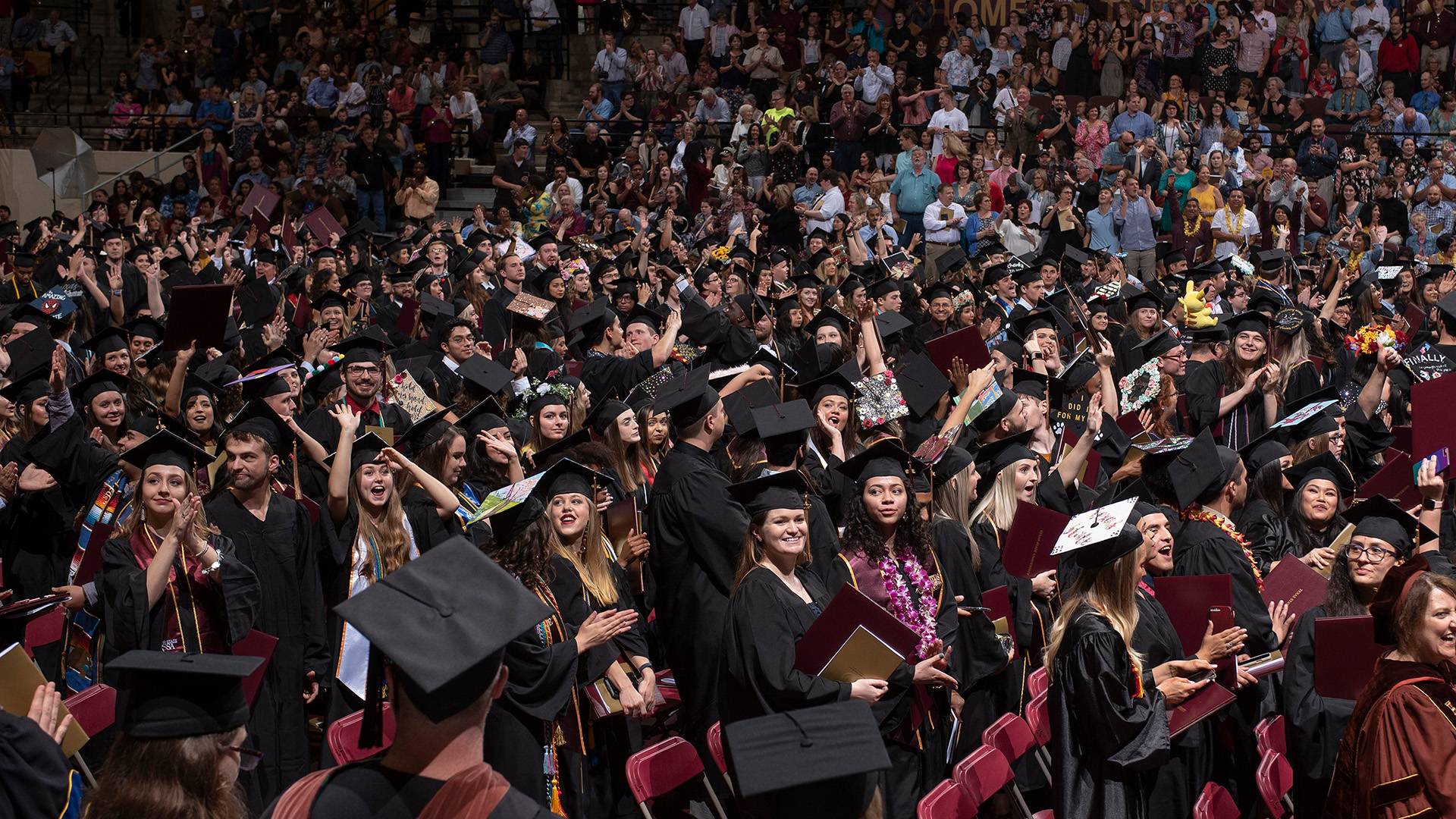 large group of Texas State University students at commencement