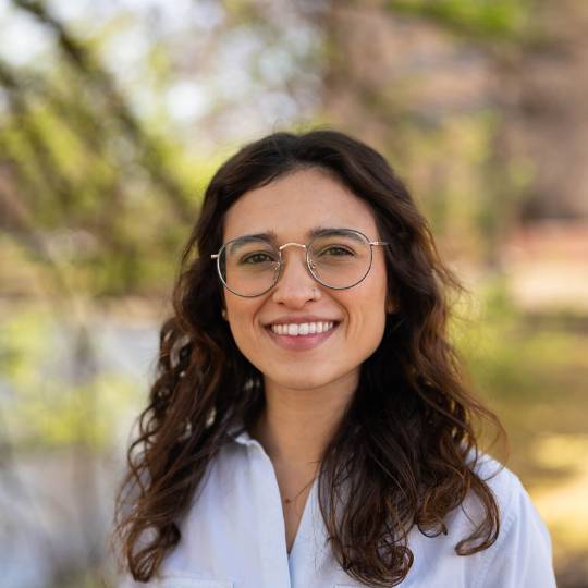 Headshot of Luísa Amato Caye