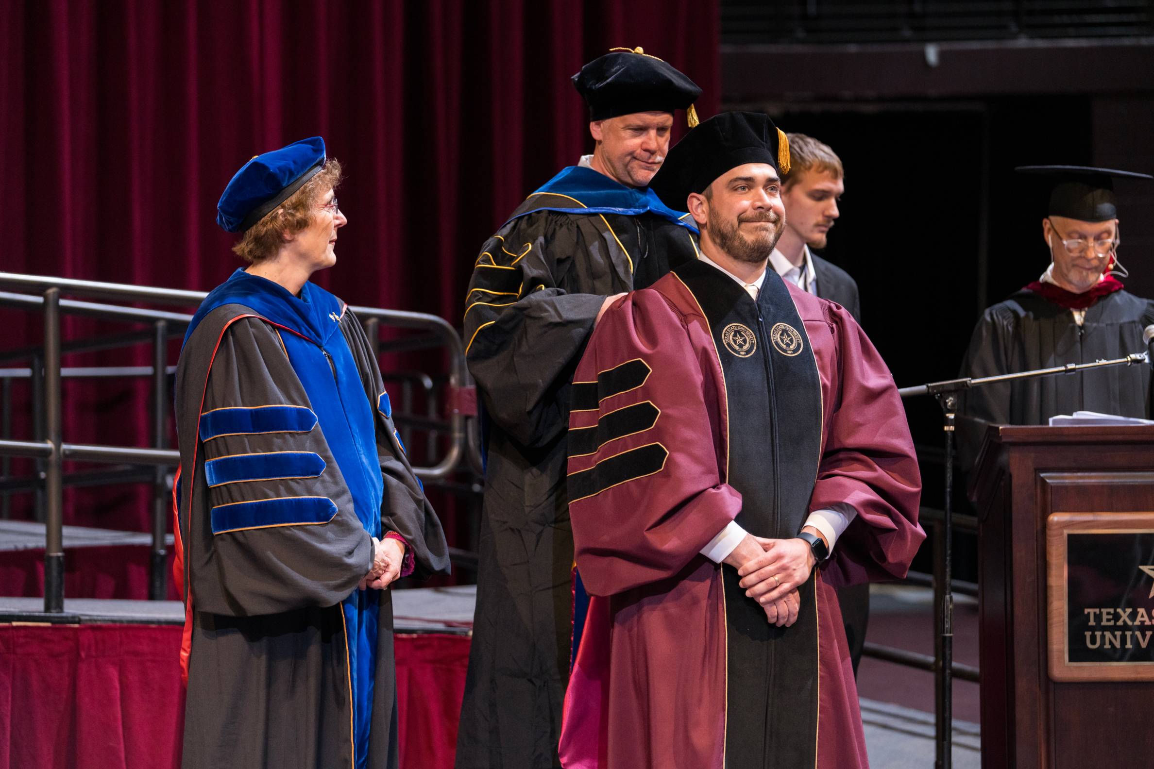 Bren being hooded at commencement