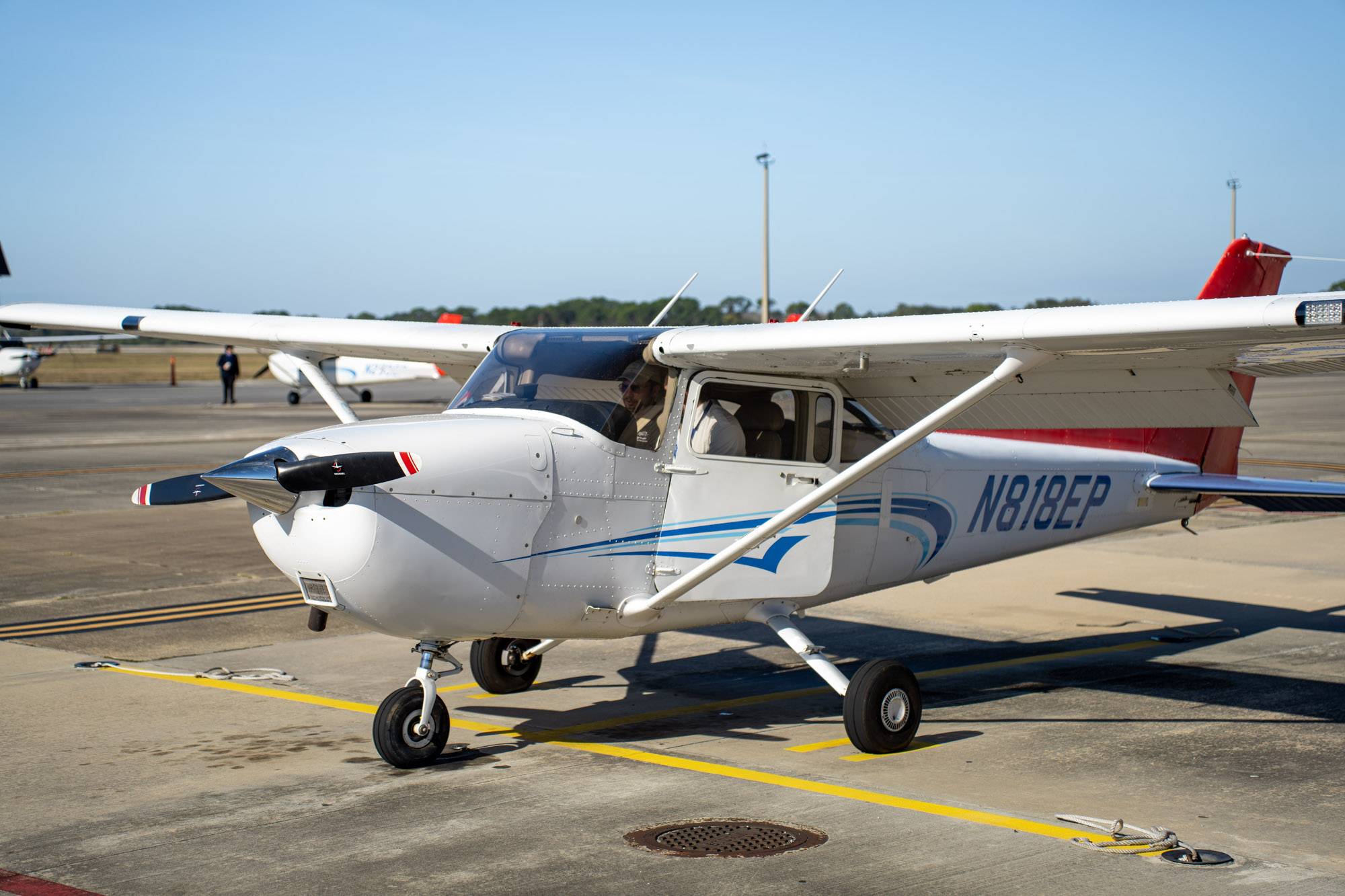 An airplane sits on a tarmac
