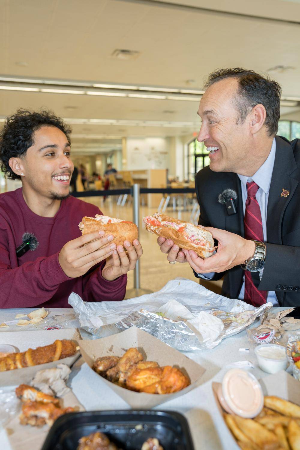 Tyson and President Damphousse try a little bit of everything at Jones Dining Center.