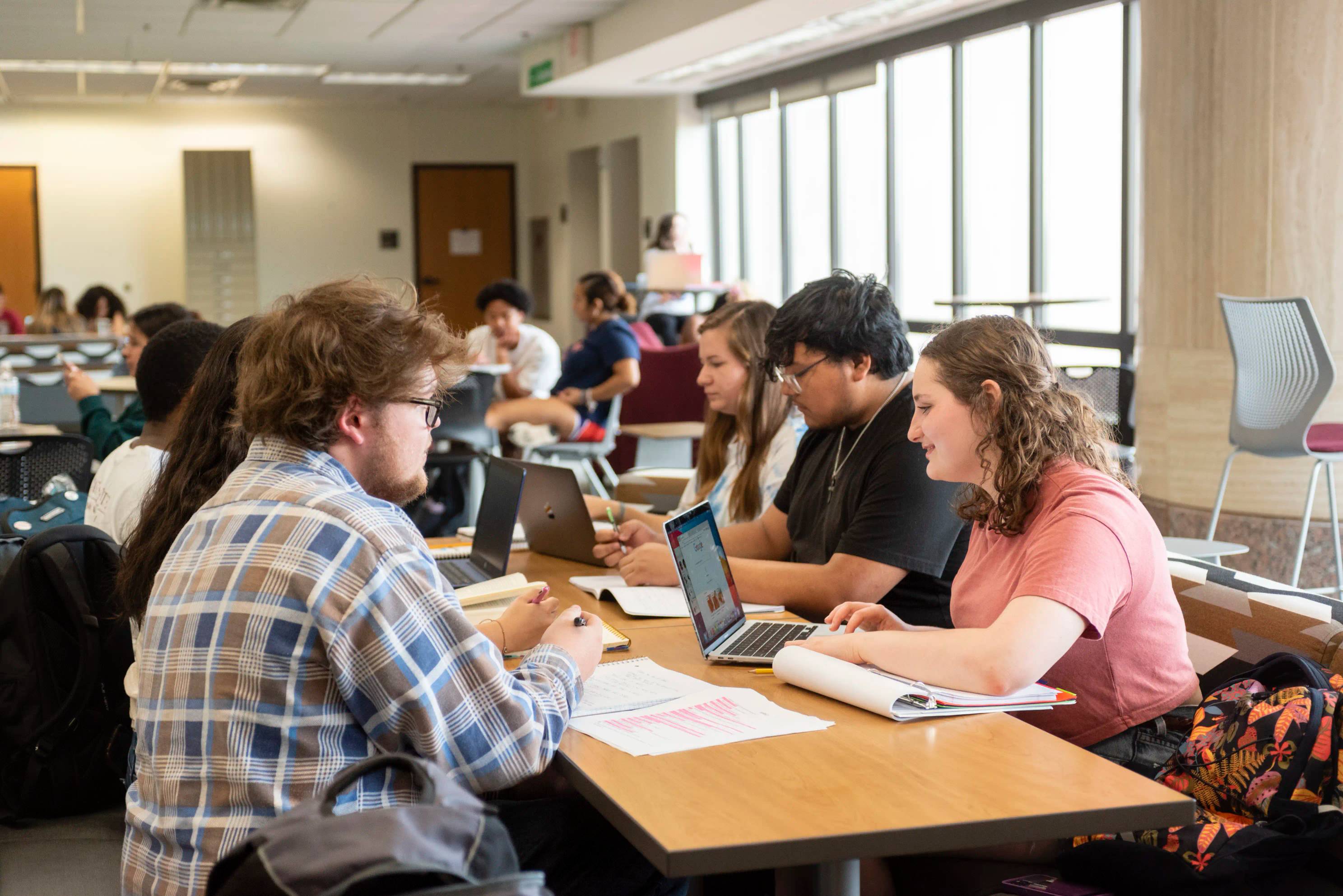 Students studying in a group. 