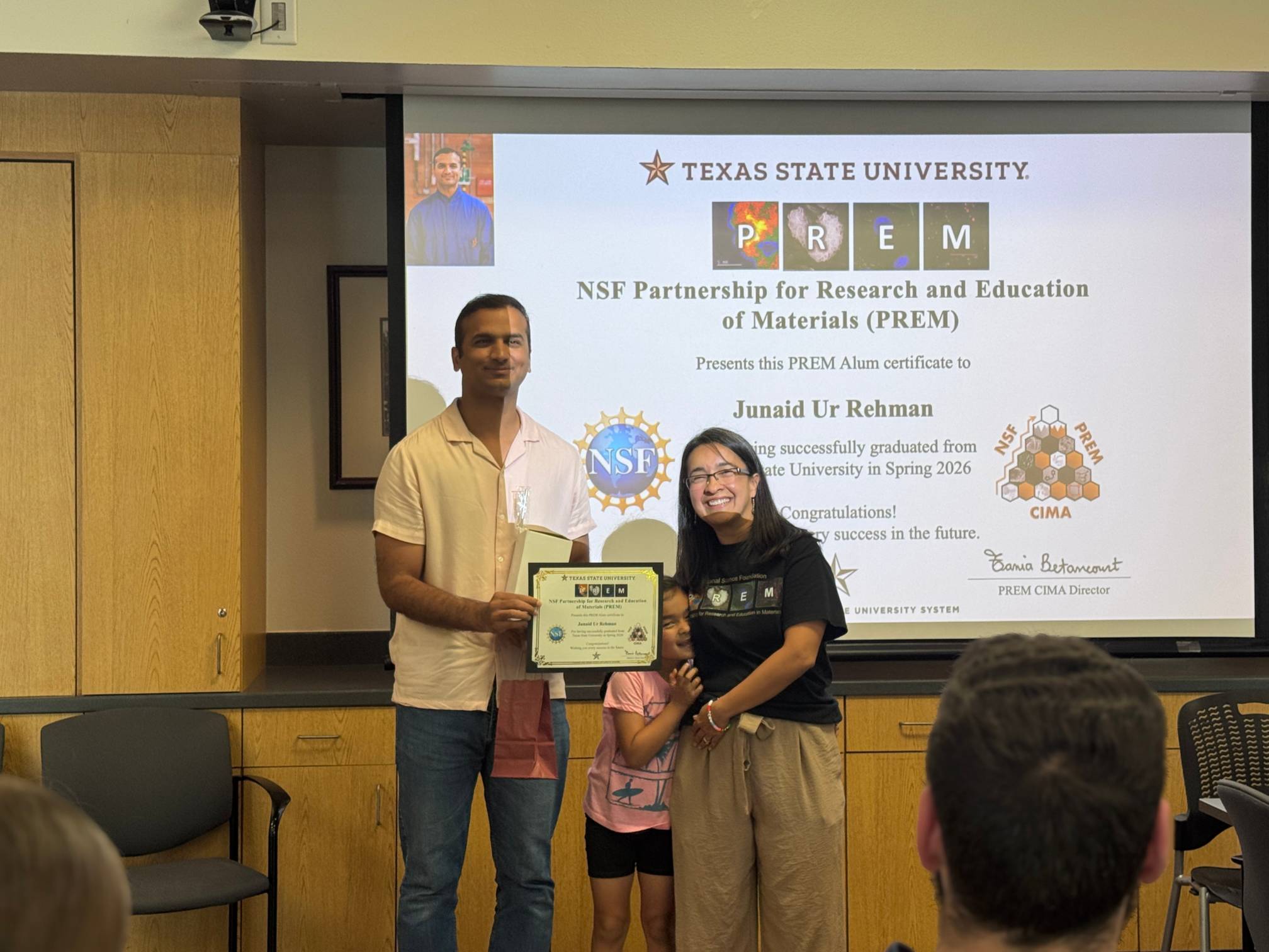 PREM Student receiving graduation award