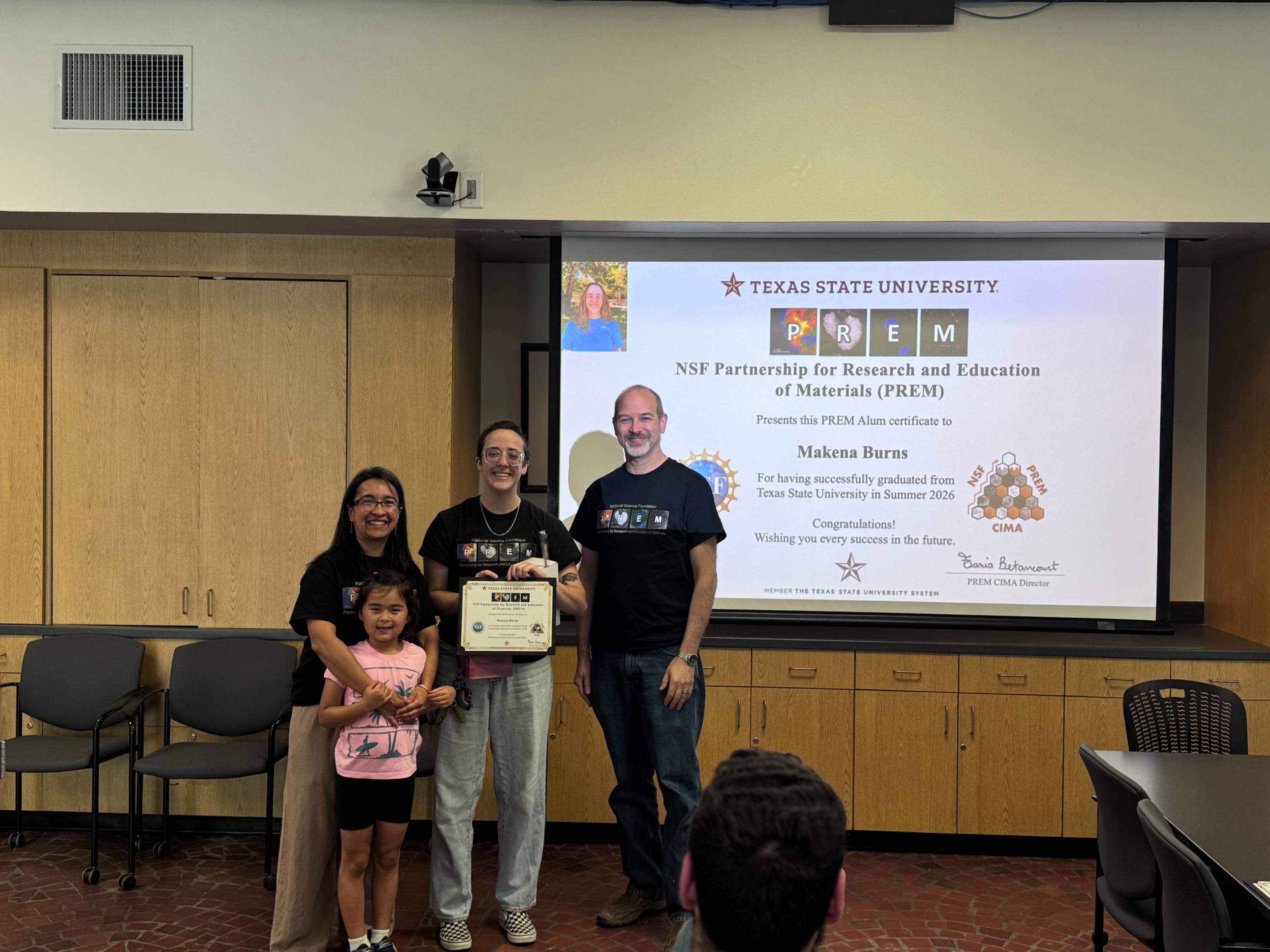 PREM Student receiving graduation award