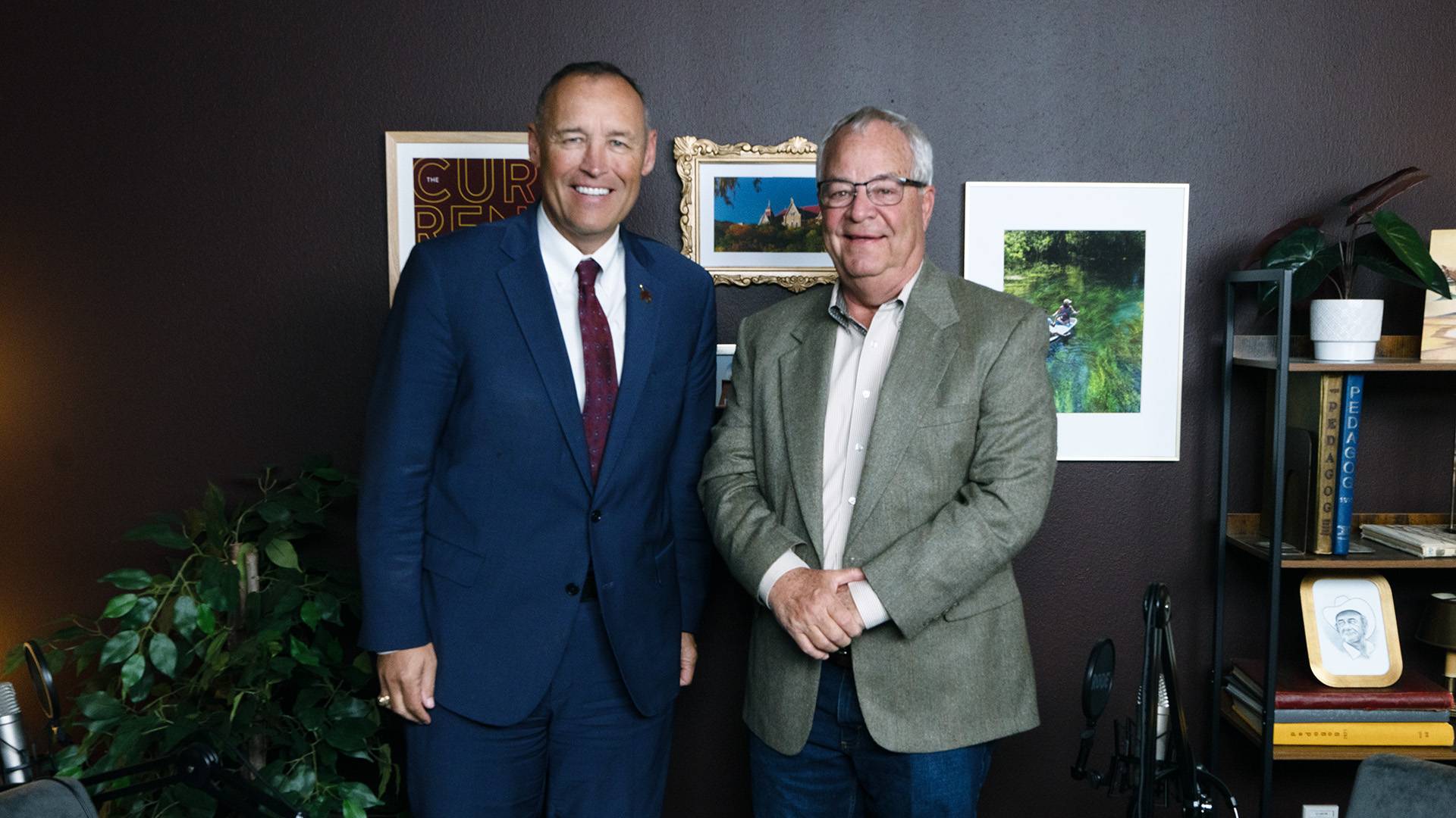 president kelly damphousse and tom madden pose for photo
