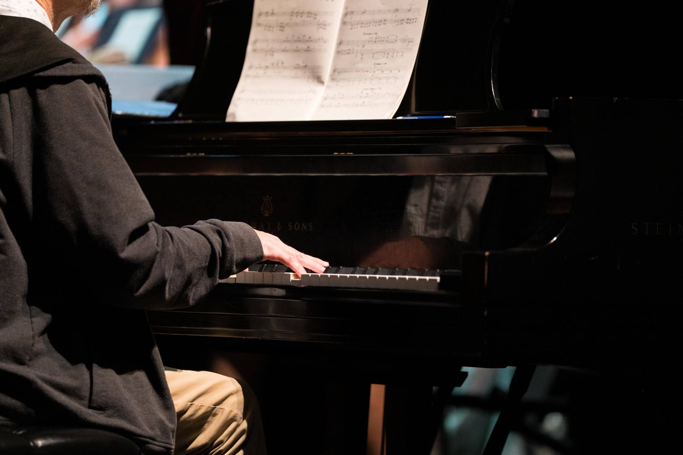 man playing piano