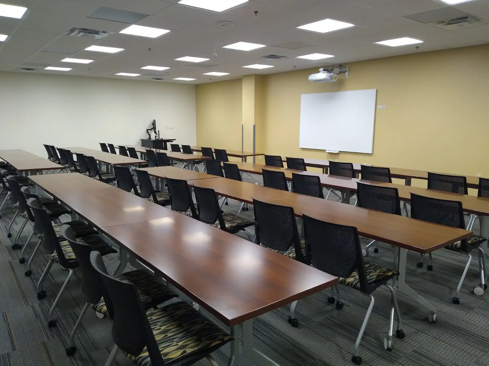 tables in seminar style from back of room