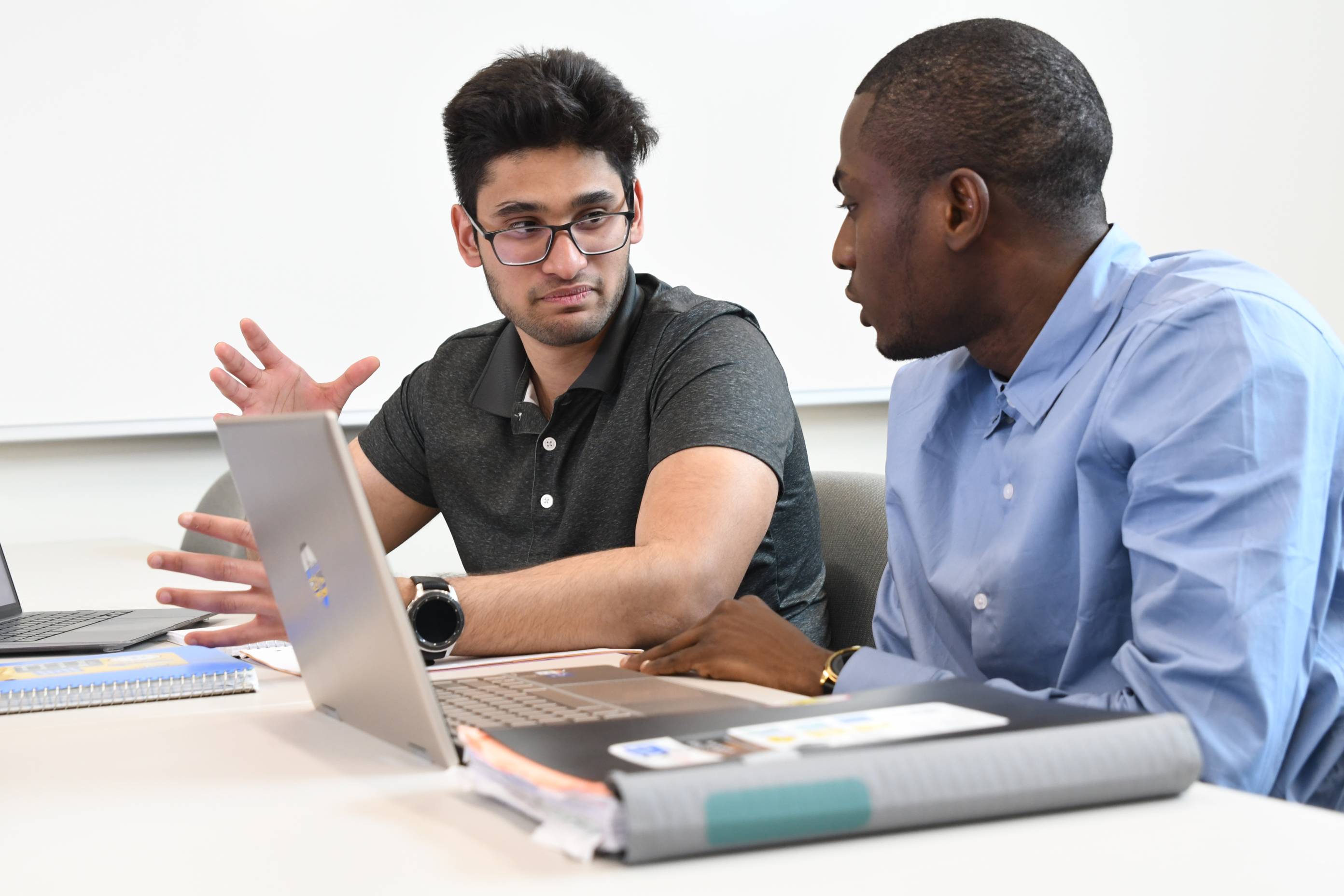 students work together in a group setting