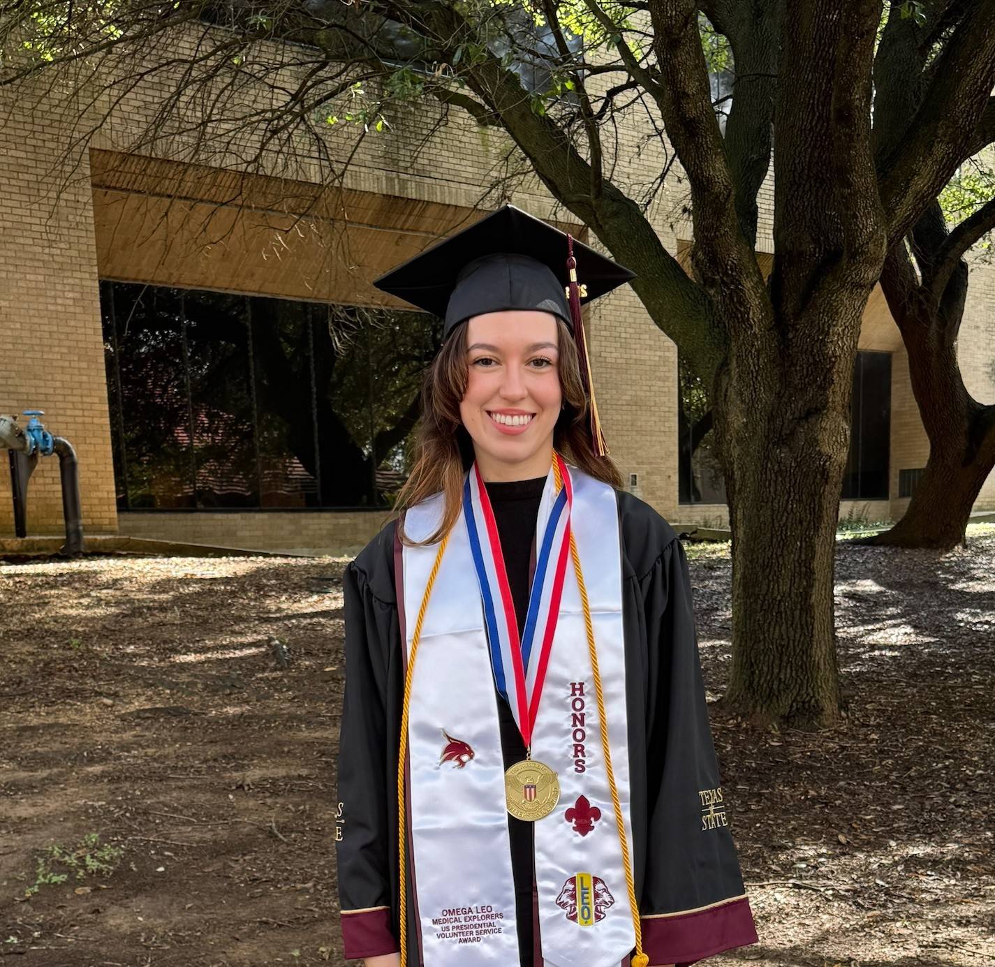 Medical Explorer honor graduate with U.S. Presidential Volunteer Service Award 