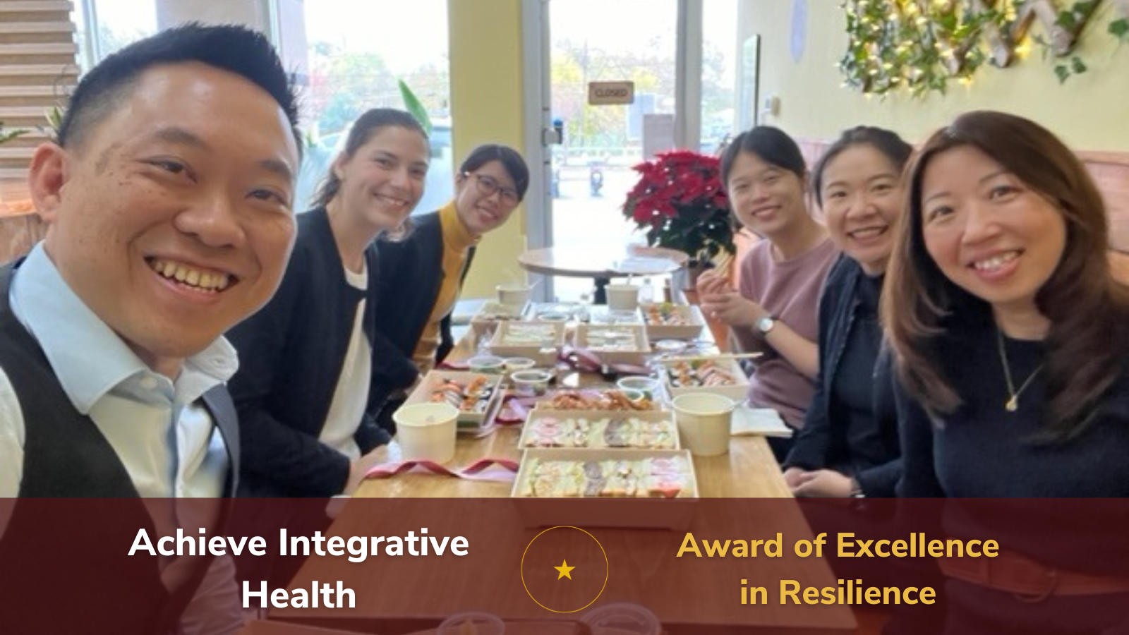 Achieve Integrative Health team smile for a photo at lunch