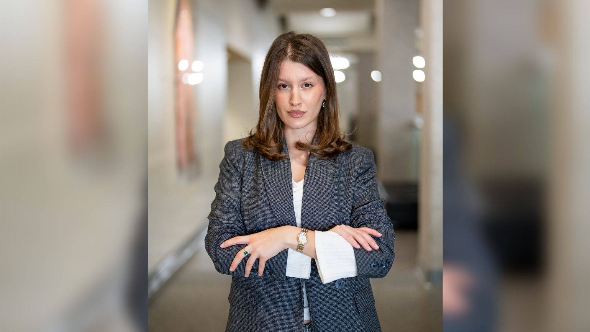 Julijana Matovic gives an interview in the hallway of McCoy College of Business