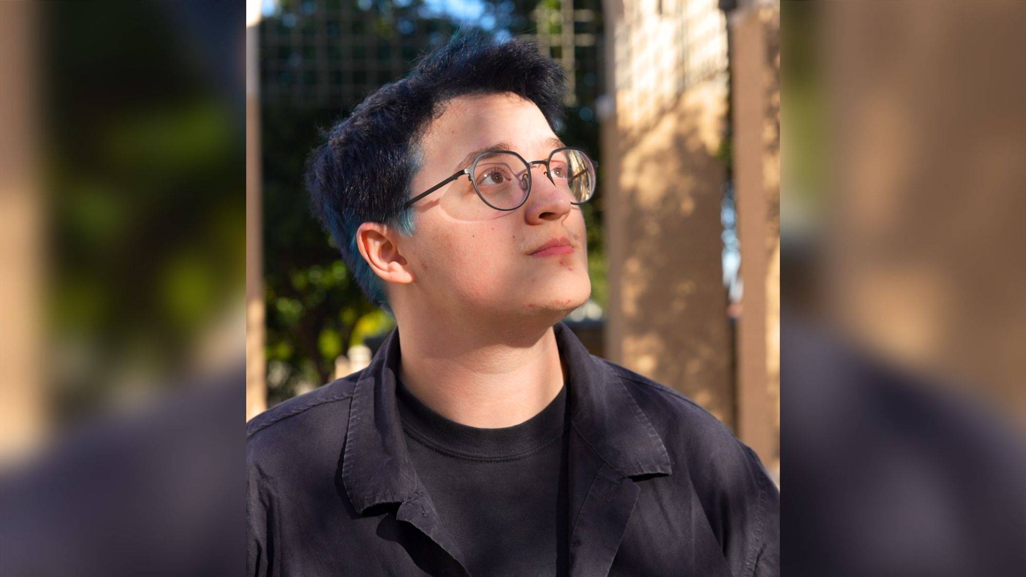 AJ Rose gives an interview about his passion for theater lighting inside the theater building