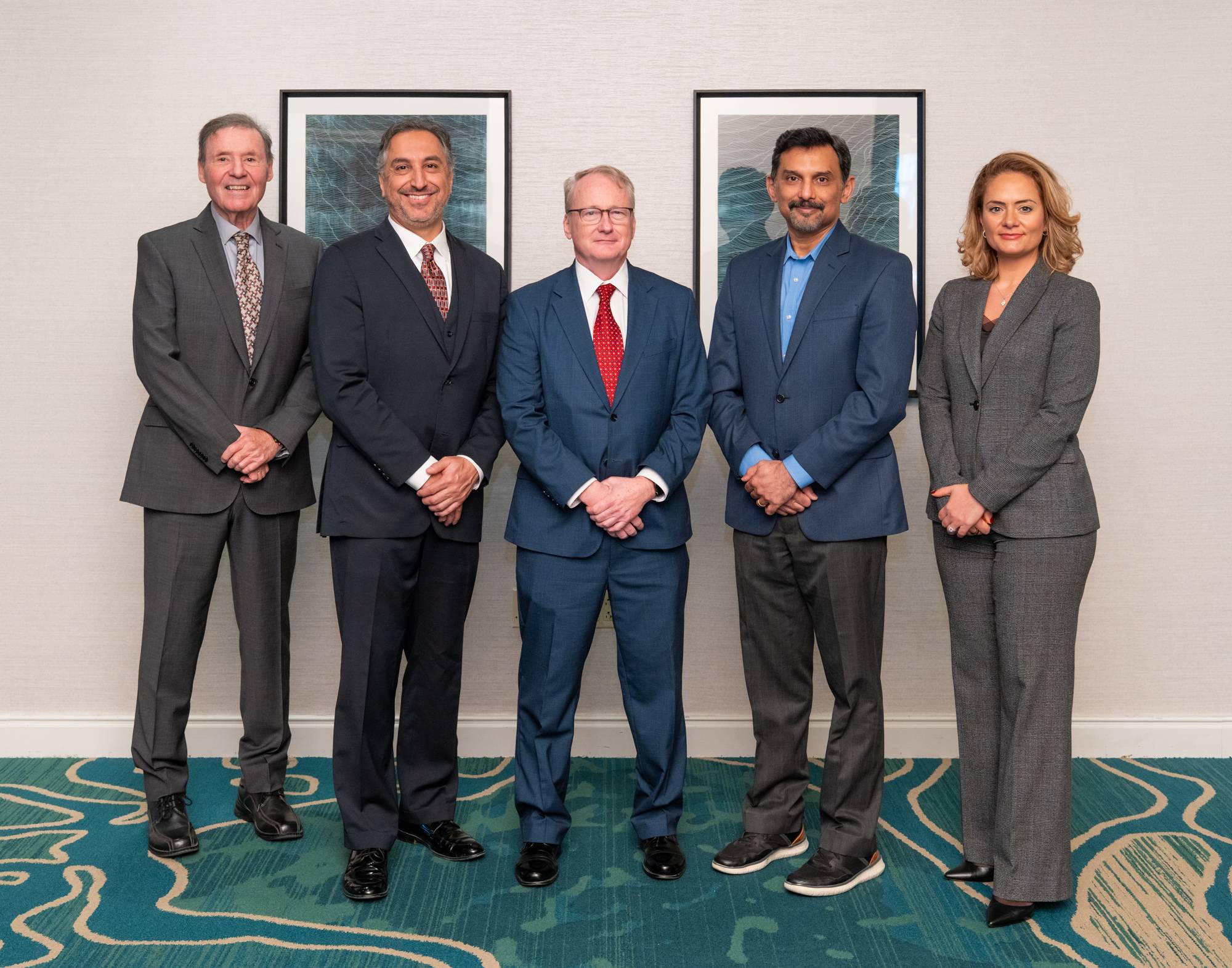 five sales faculty standing together