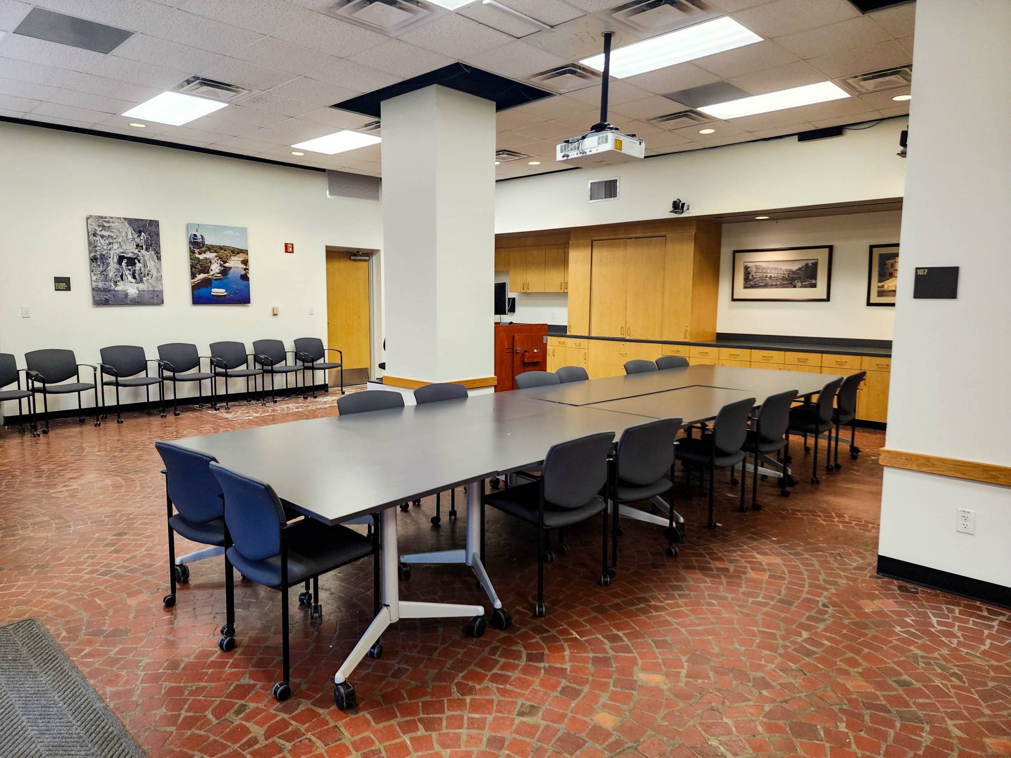 Right view of the conference room table with chairs.