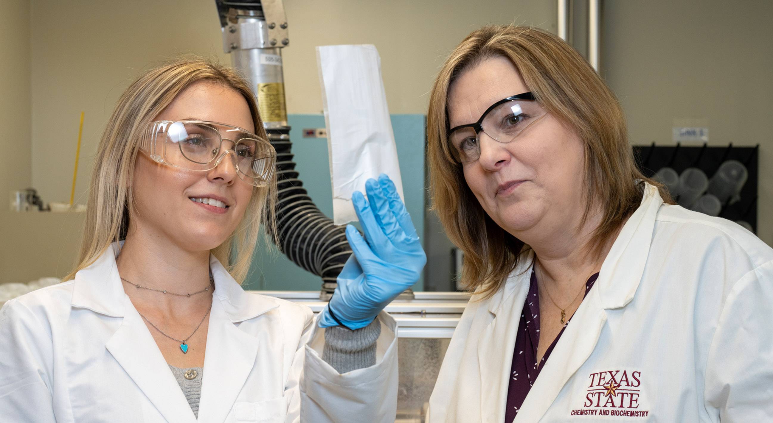 undergraduate chemistry student, Melany Bouyer, and Dr. Jennifer Irvin developing polymer mats