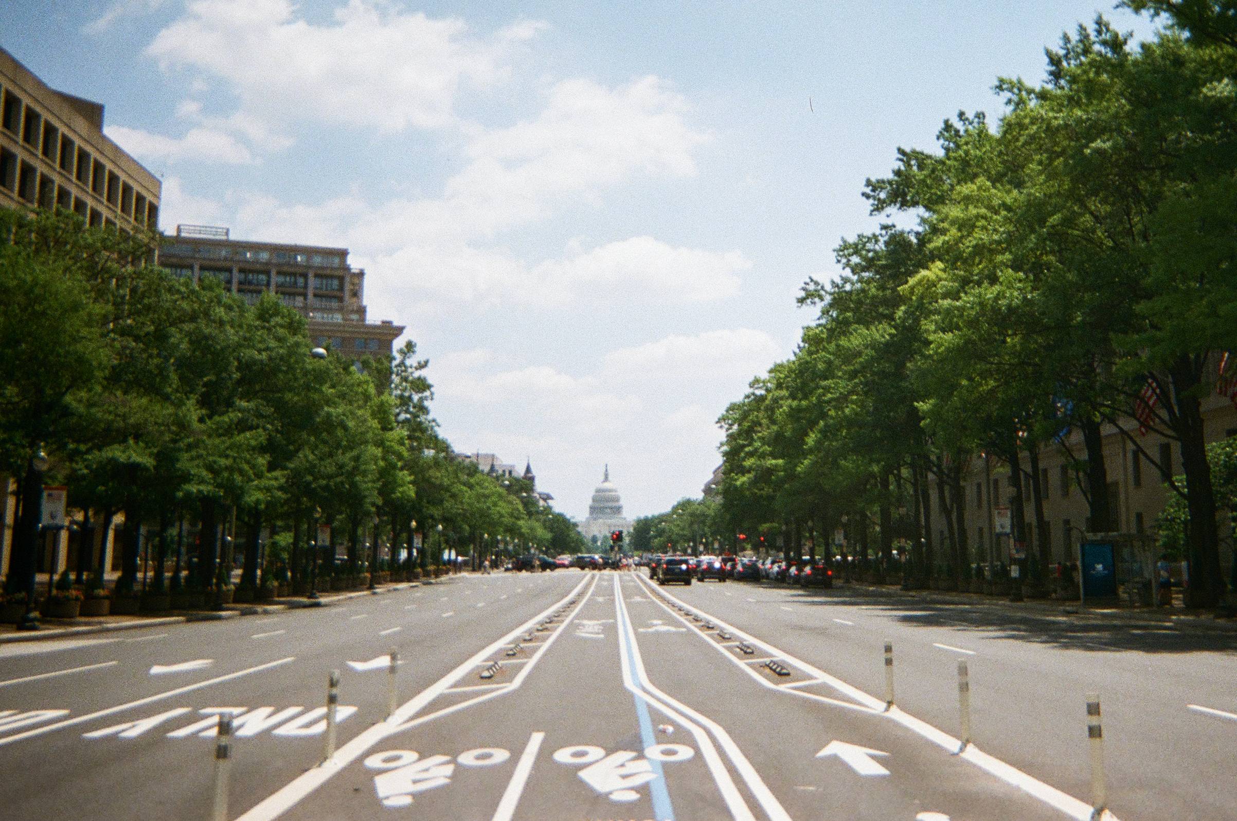 wide street view of the capitol in D.C.