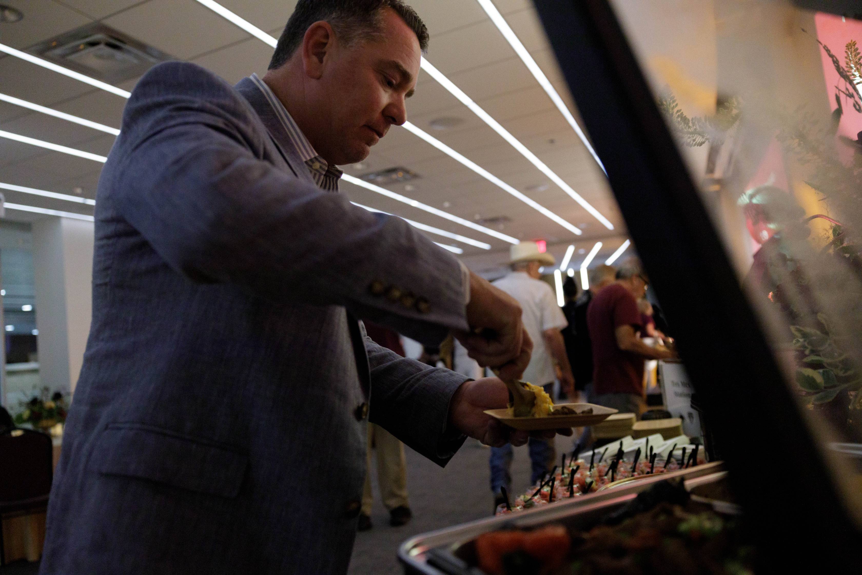 catered event guest serving themselves food
