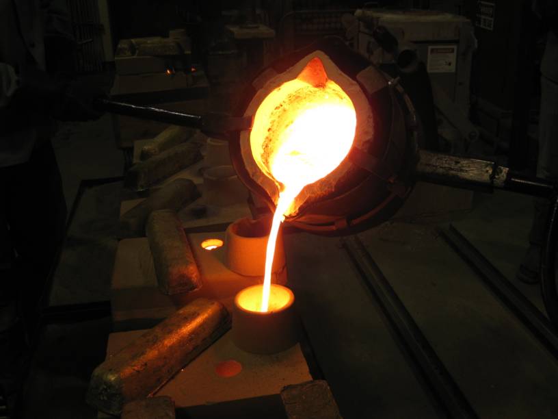 melted metal being poured