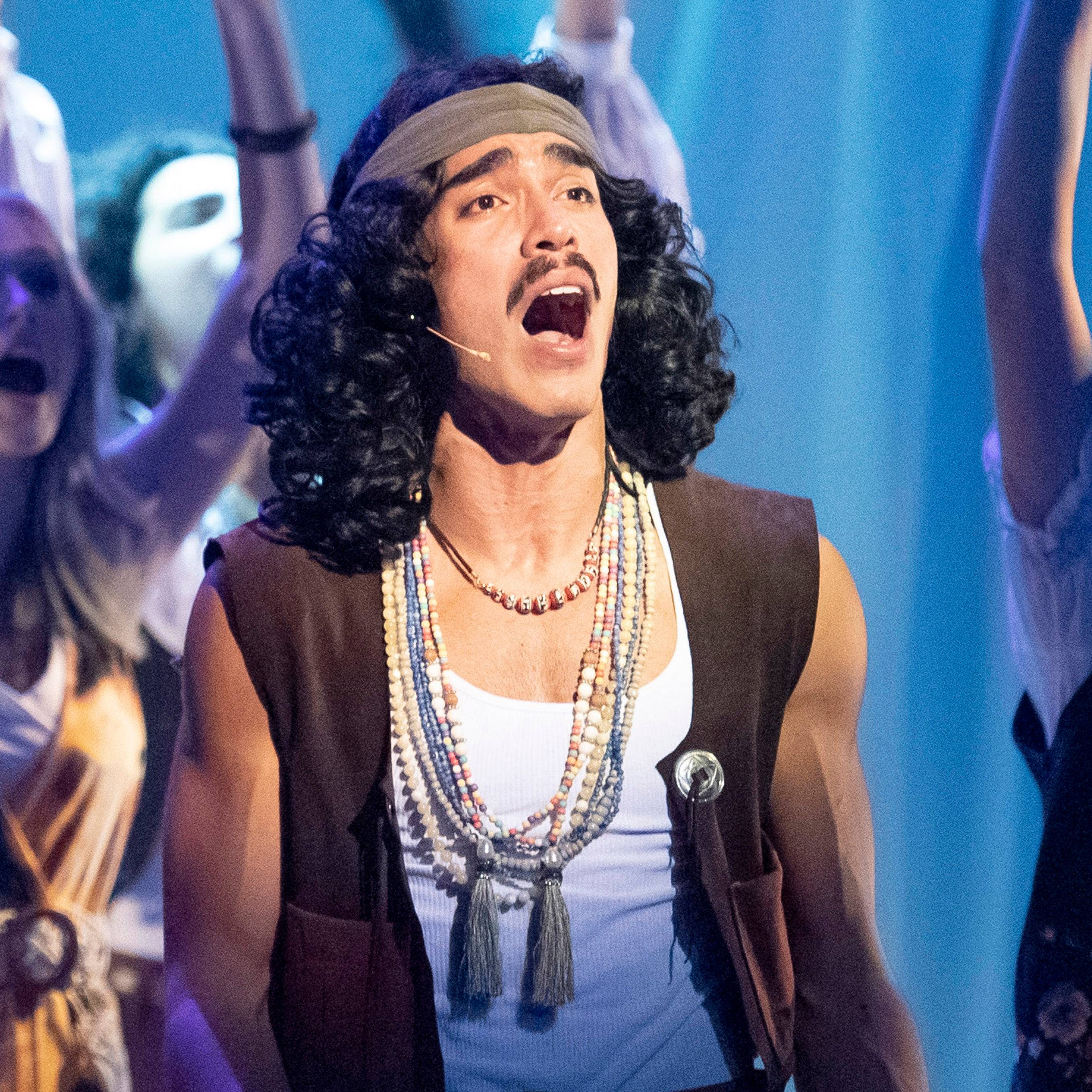 Performer on stage during a musical.
