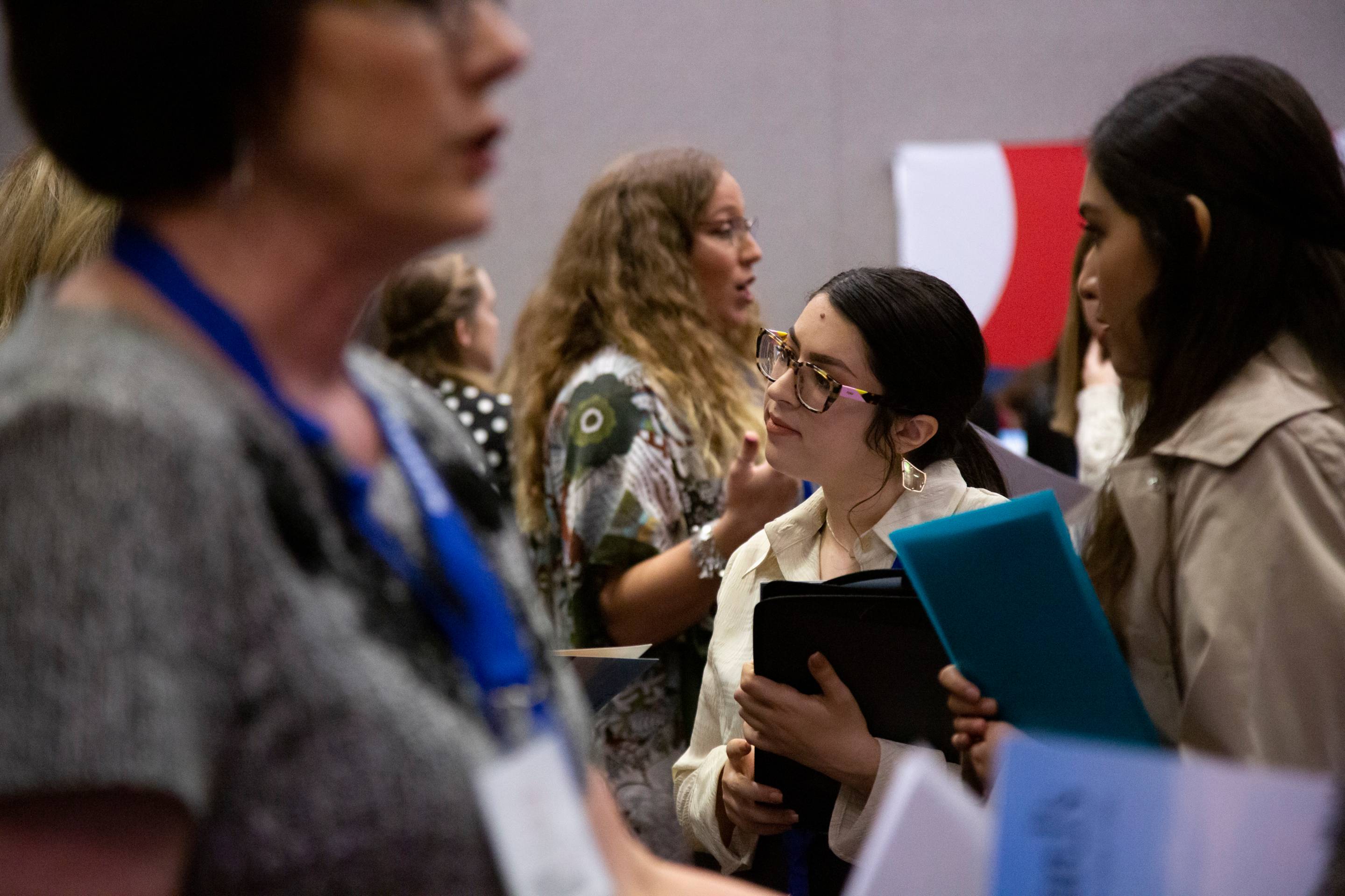 focus on student at networking event