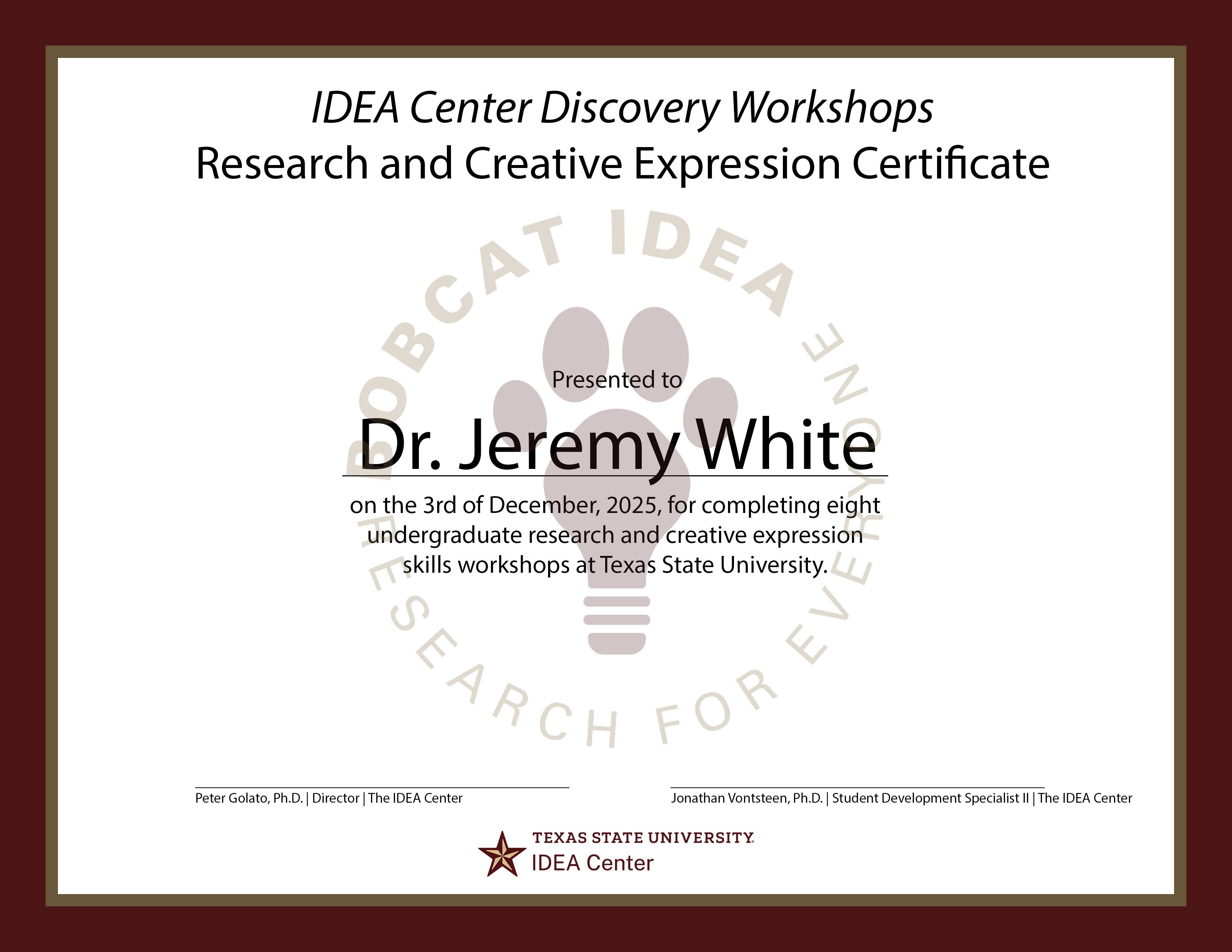 image of a certificate from the IDEA Center for research activities. the backdrop of the certificate is a paw print shaped like a light bulb