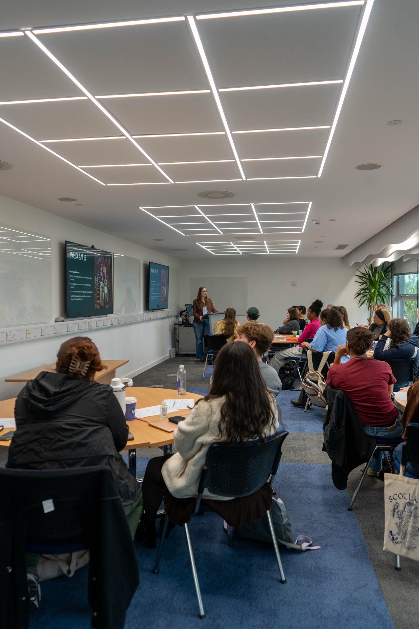 students in classroom listening to guest lecture