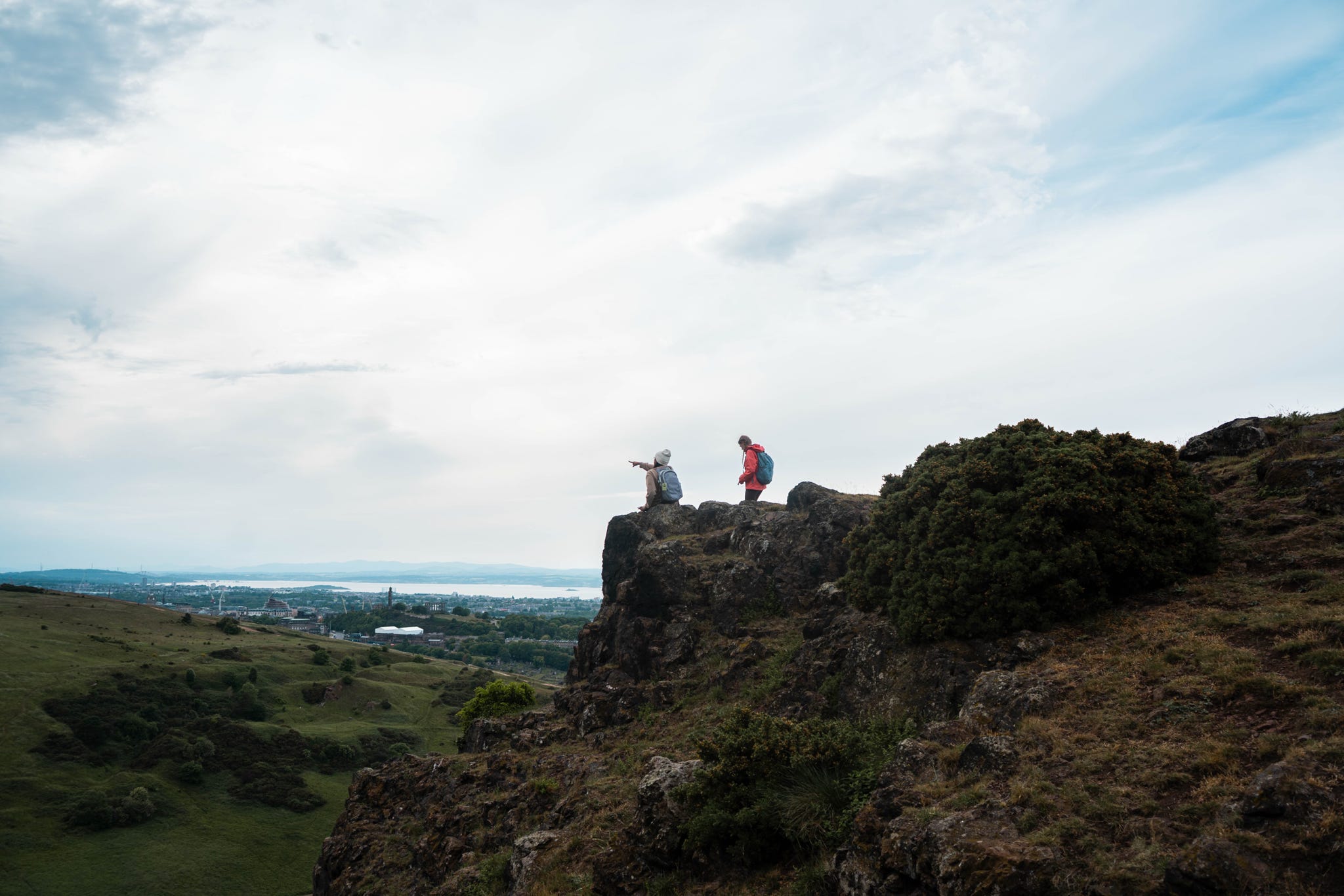 students climbing Arthurs seat